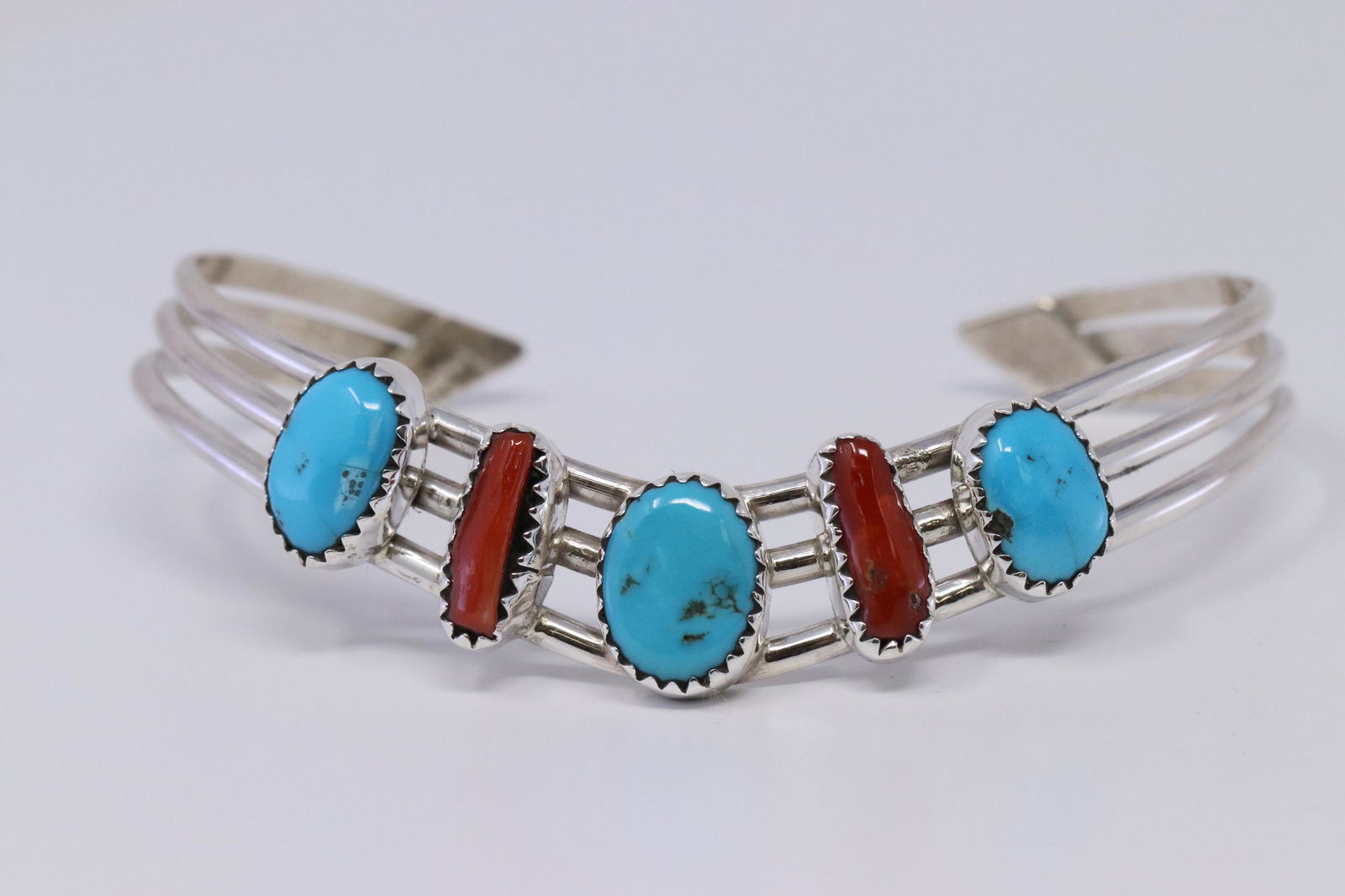 Navajo made sterling silver "V" shape bracelet with (1 of 4)