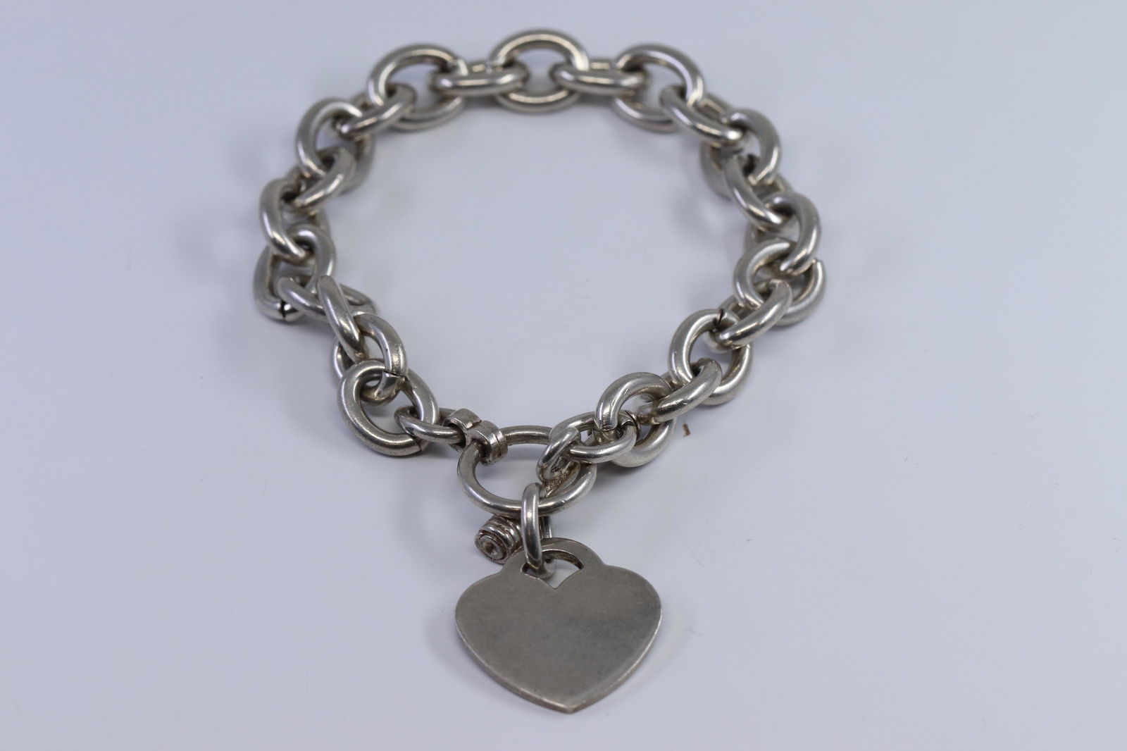 Ladies Name Tage Silver Bracelet: This is a Ladies Name Tage Silver Bracelet. The bracelet is in a verey good condition bracelet size is 7.50''. Total bracelet weight is 40.70g.