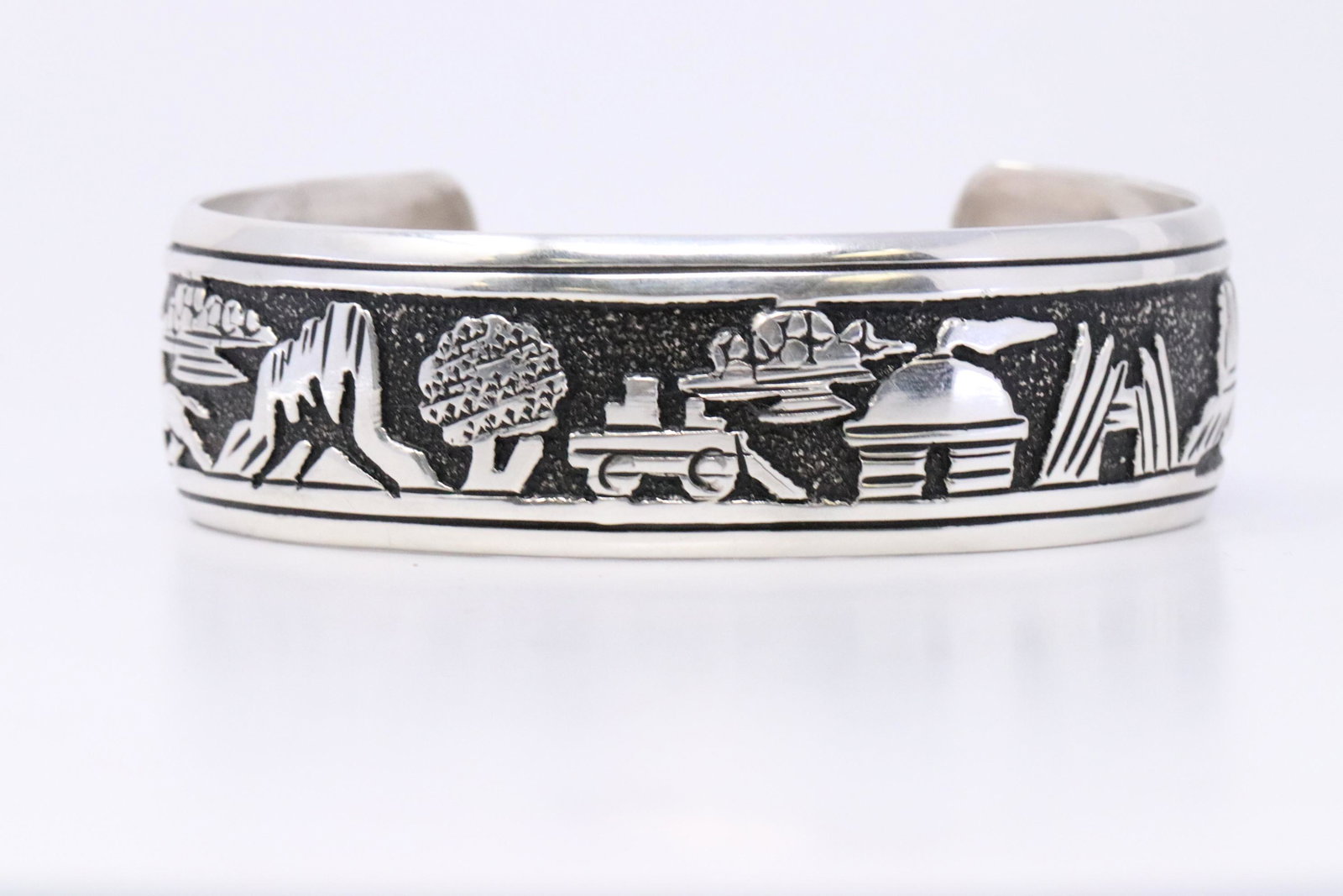 Native American Navajo Handmade Sterling Silver: This is a Native American Navajo Handmade Sterling Silver Storyteller by T&R Singer. Bracelet Maesurement inside is 6.00in