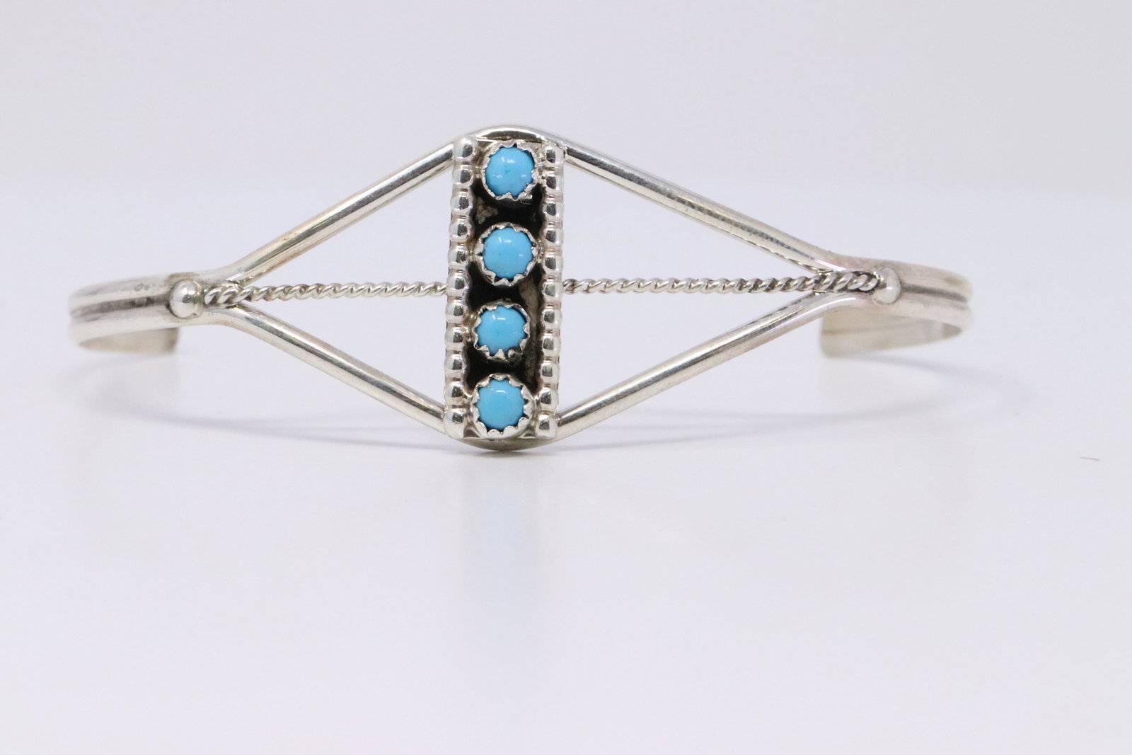Native American Navajo Handmade Sterling Silver: This is a Native American Navajo Handmade Sterling Silver Turquoise Bracelet by Janice Spencer. Bracelete Measurement inside is 5.00in