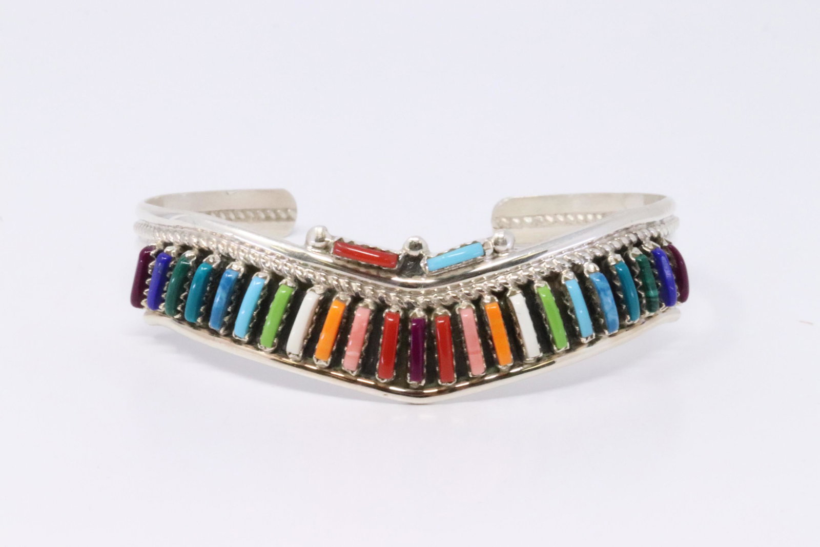 Native American Navajo Handmade Sterling Silver: This is a Native American Navajo Handmade Sterling Silver Multi-Color Needlepoint Bracelet by Nathan Shorty.Bracelet Measurement inside is 5.50in