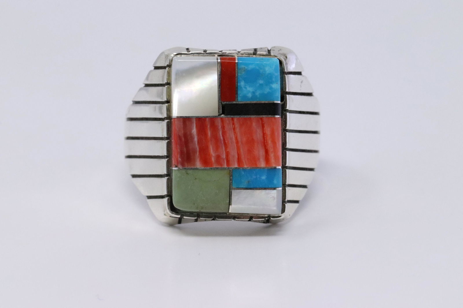 Native American Navajo Handmade Sterling Silver: This is a Native American Navajo Handmade Sterling Silver Multi-Color Ring by Ray Jack. Ring Size is 13.00