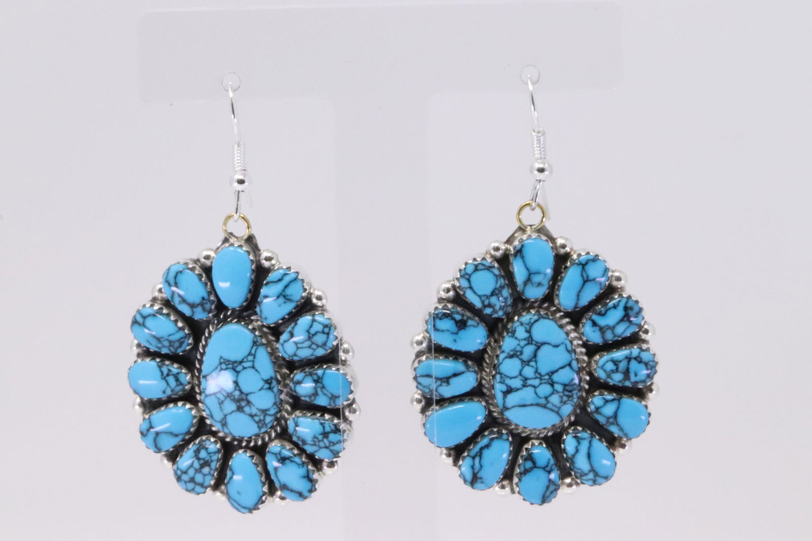 Native American Navajo Handmade Sterling Silver: This is a Native American Navajo Handmade Sterling Silver Turquoise Cluster Earrings by Agustin Sandoval. Earings Length is 2.50in"