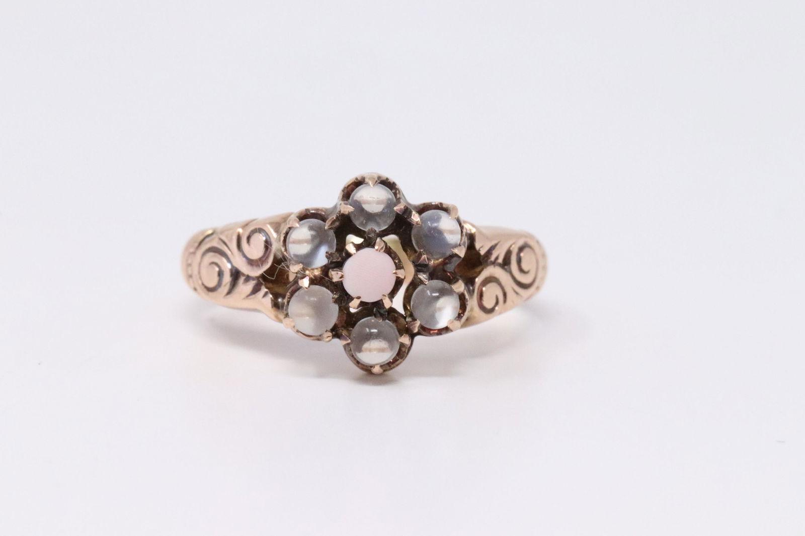 Arte deco Opal and moon Stone Ring: This is a 14k rose gold Art deco or Antique Ring Opal center stone Moonstone Accent ring appears to be for childeren. Ring size 3. Total weight 2.9 grams.