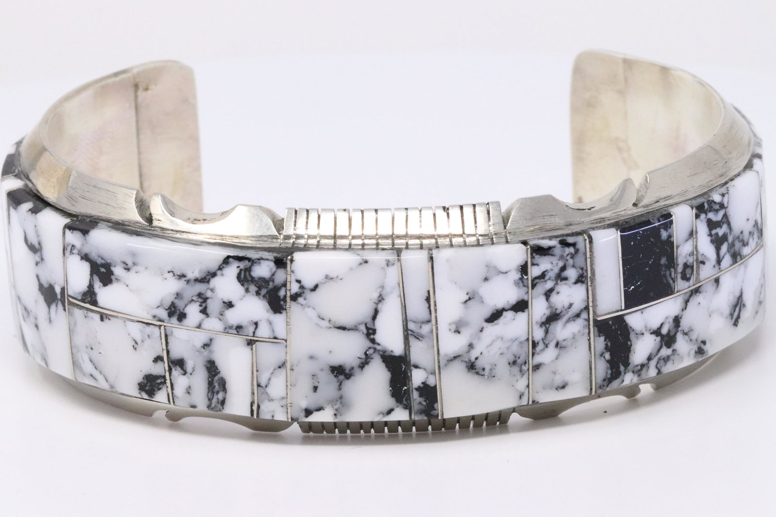 Native American Navajo Handmade Sterling Silver: This is a Native American Navajo Handmade Sterling Silver Synthetic White Buffalo Inlay Bracelet by Steve Francisco. Bracelet Measurement inside is 6.50in