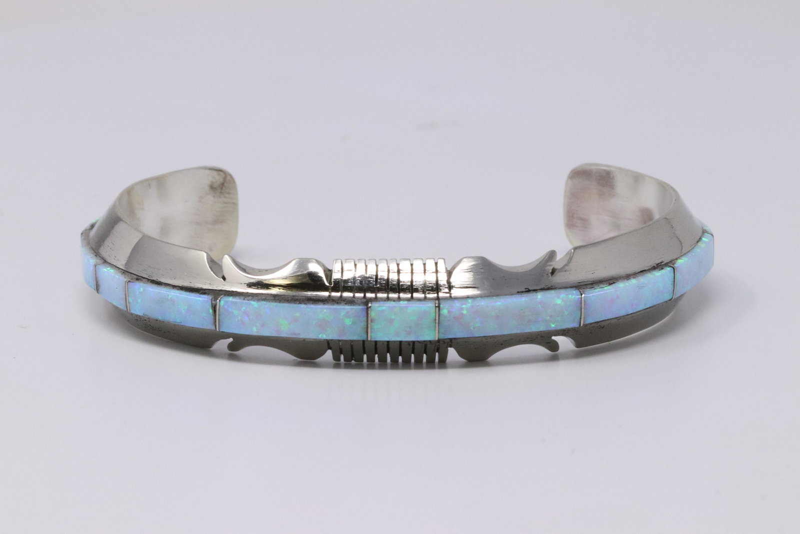 Native American Navajo Handmade Sterling Silver: This is a Native American Navajo Handmade Sterling Silver Synthetic Opal Inlay Bracelet by Steve Francisco.