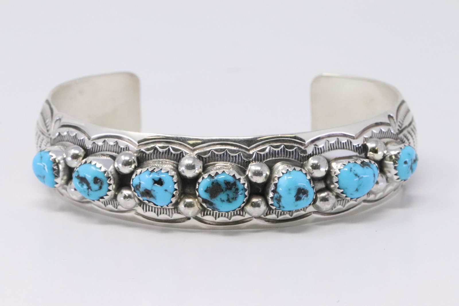 Native American Navajo Handmade Sterling Silver: This is a Native American Navajo Handmade Sterling Silver Turquoise Bracelet by Grace Silver.