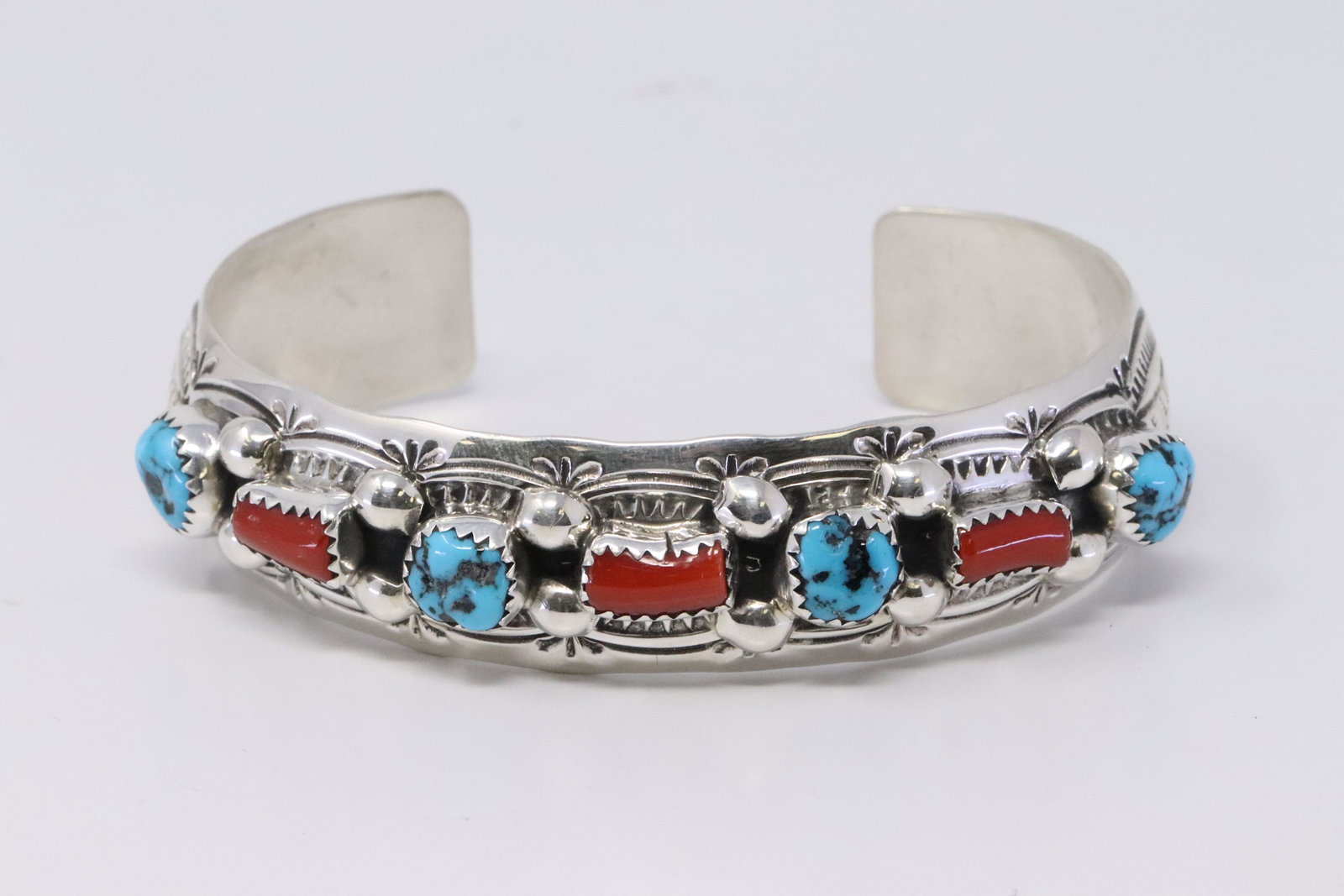 Native American Navajo Handmade Sterling Silver: This is a Native American Navajo Handmade Sterling Silver Turquoise and Coral Bracelet by Grace Silver.
