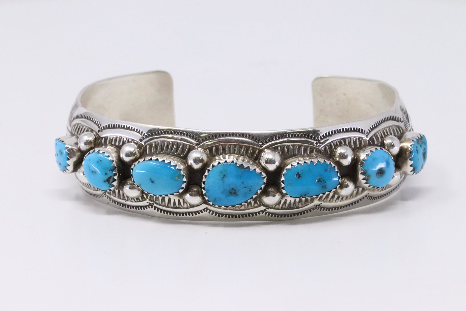Native American Navajo Handmade Sterling Silver: This is a Native American Navajo Handmade Sterling Silver Turquoise Bracelet by Grace Silver.