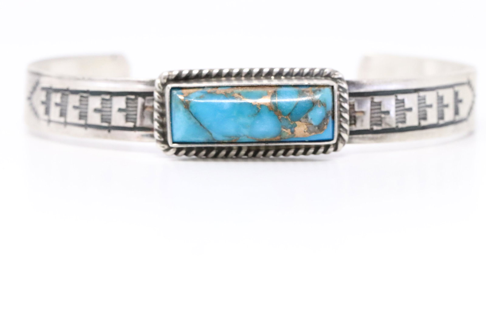 Native American Navajo Handmade Sterling Silver Spiny: This is a Native American Navajo Handmade Sterling Silver Spiny Turquoise Bronze Bracelet by Rick Enriquez. Bracelet Measurement inside is 5.50in