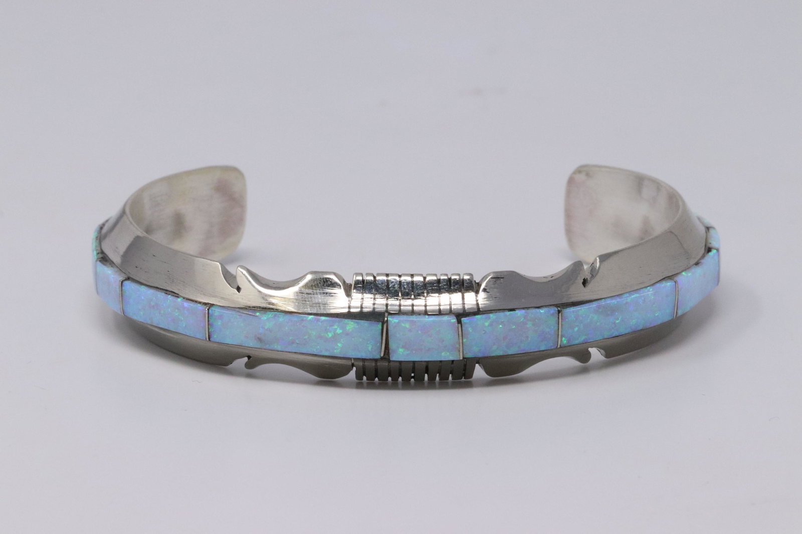 Native American Navajo Handmade Sterling Silver: This is a Native American Navajo Handmade Sterling Silver Synthetic Opal Bracelet by Steve Francisco.