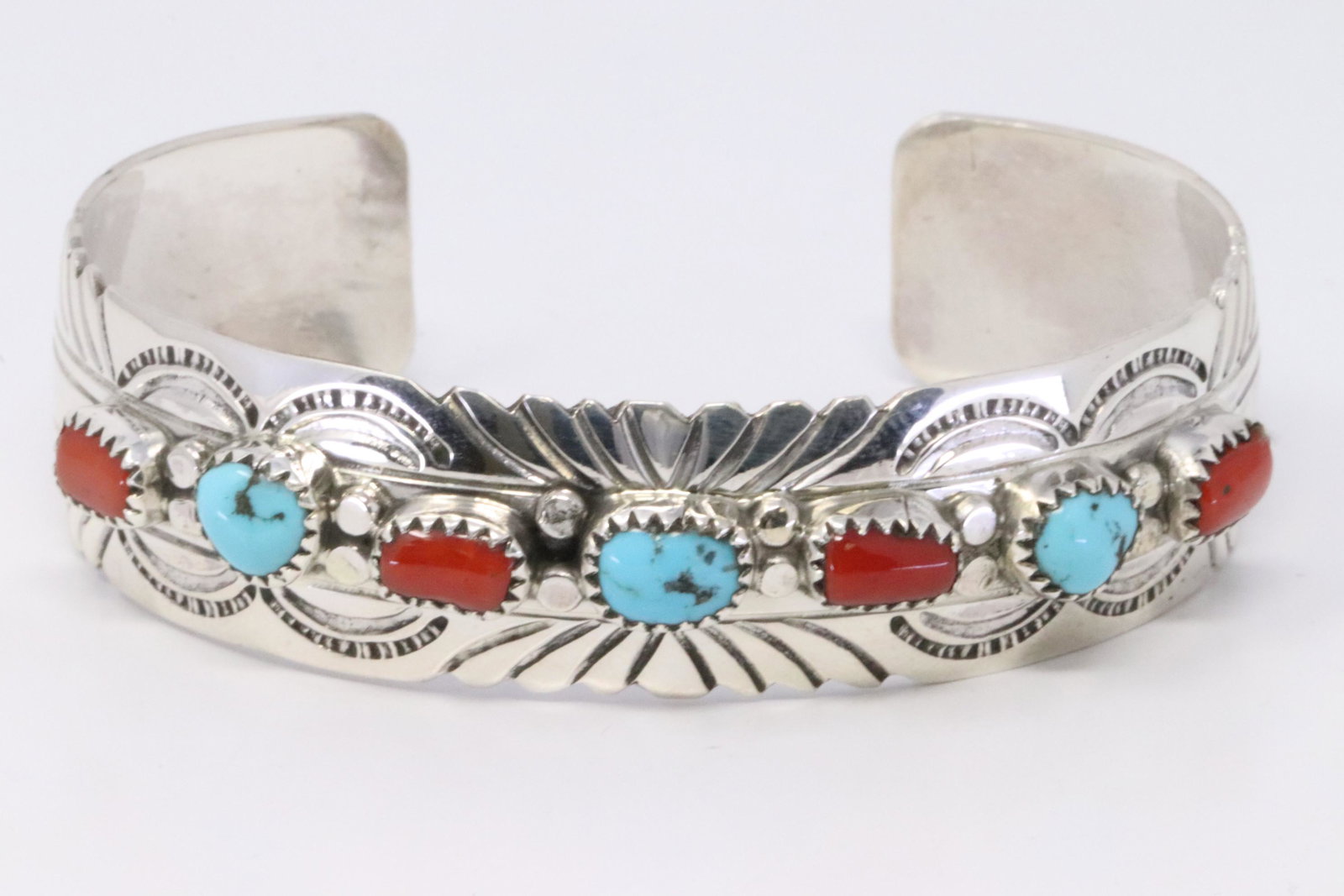 Native American Navajo Handmade Sterling Silver: This is a Native American Navajo Handmade Sterling Silver Turquoise & Coral Bracelet by Julia Slinky.Bracelet Measurement inside is 6.00in