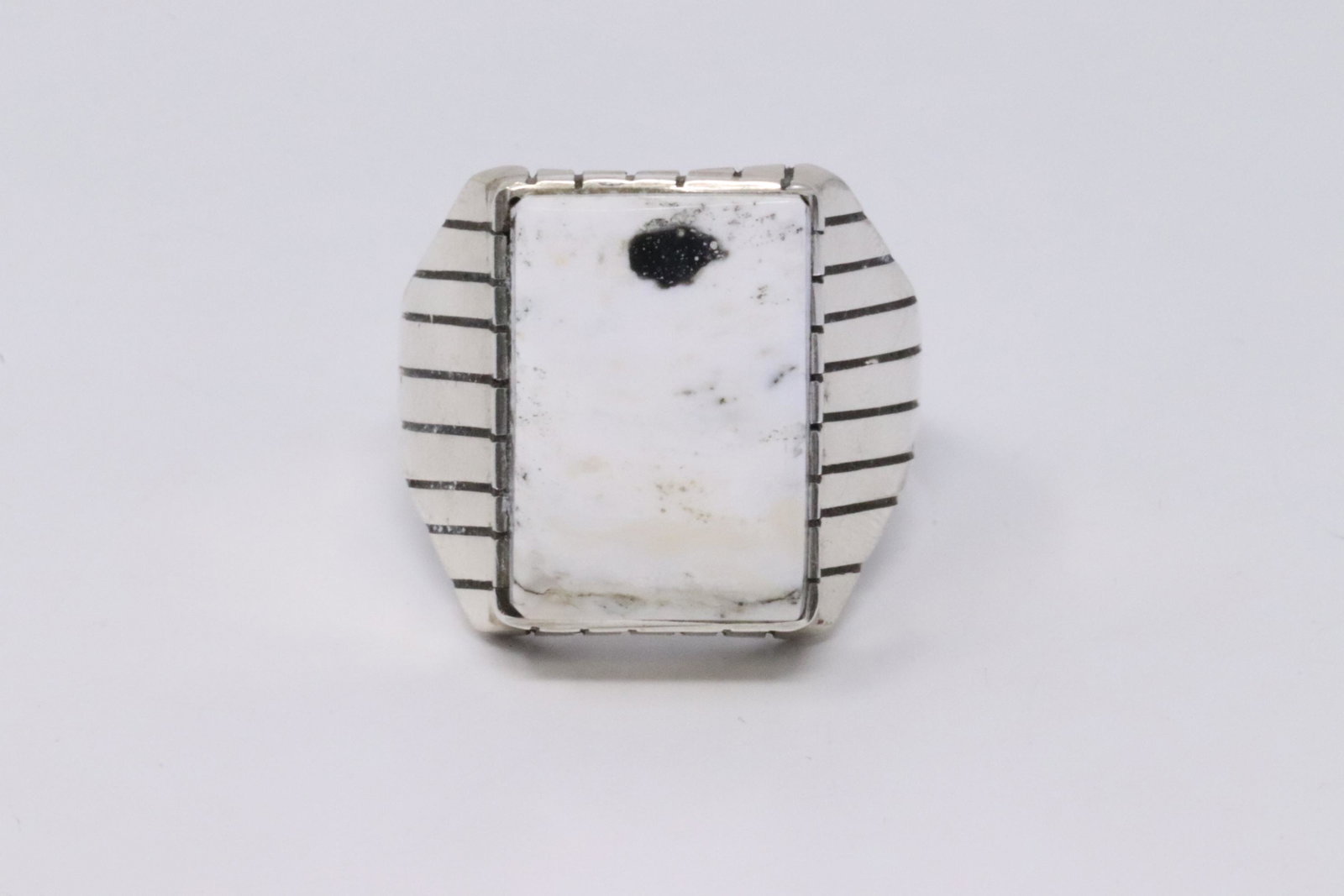 Native American Navajo Handmade Sterling Silver White: This is a Native American Navajo Handmade Sterling Silver White Buffalo Stone Size is 2.00mmX1.50mm Ring by Ray Jack.Ring Size is 13.00