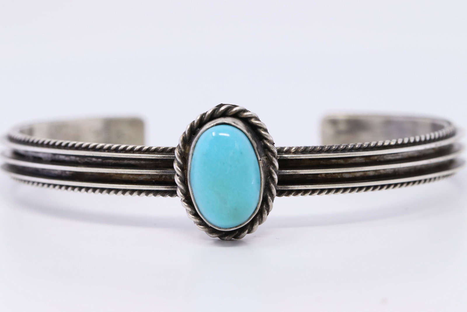 Native American Navajo Handmade Sterling Silver: This is a Sterling Silver KingmanTurquoise Bracelet by Wilson Dawes.