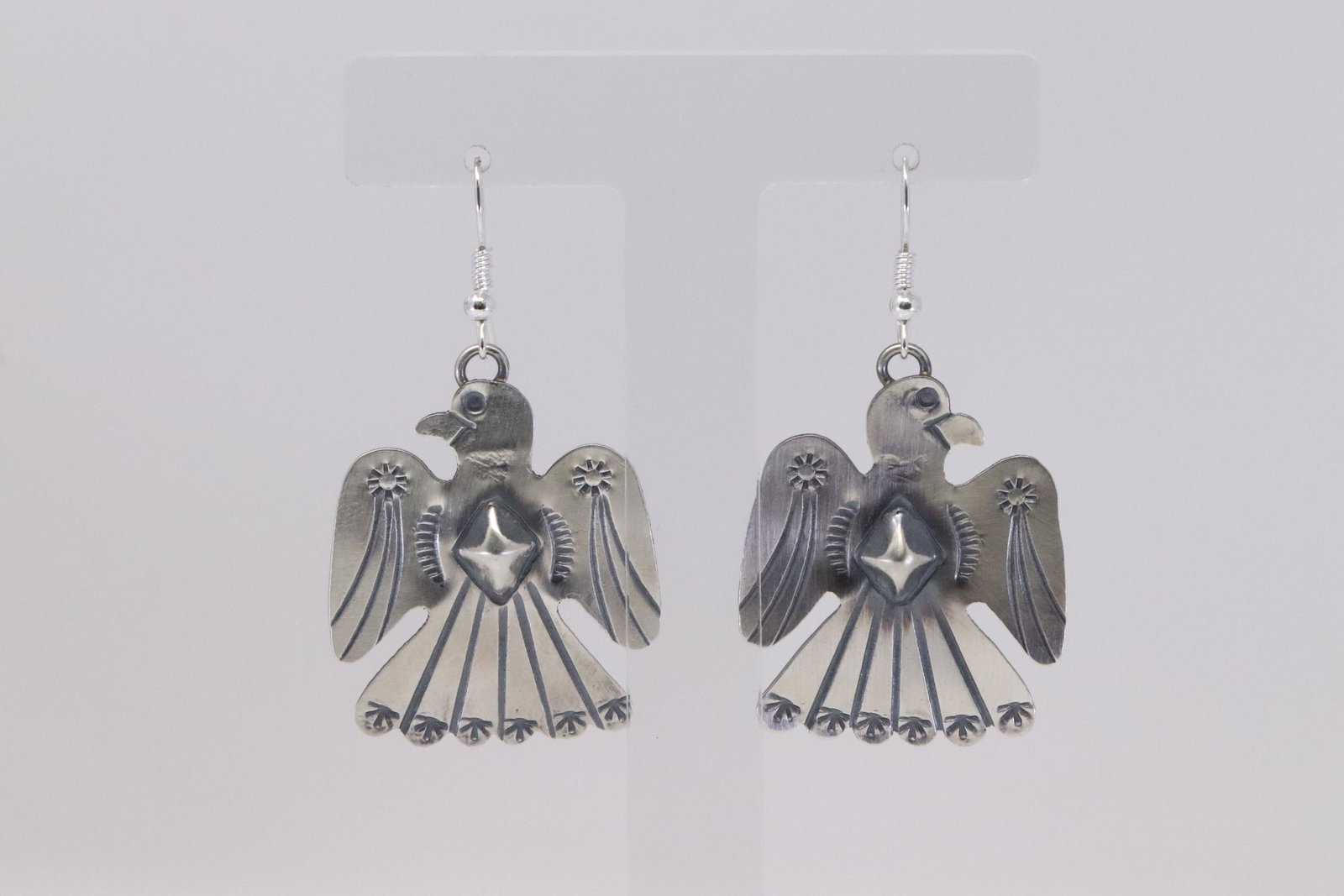 Native American Navajo Handmade Sterling Silver: This is a Native American Navajo Handmade Sterling Silver Thunderbird Dangle Earrings by Tim Yazzie.