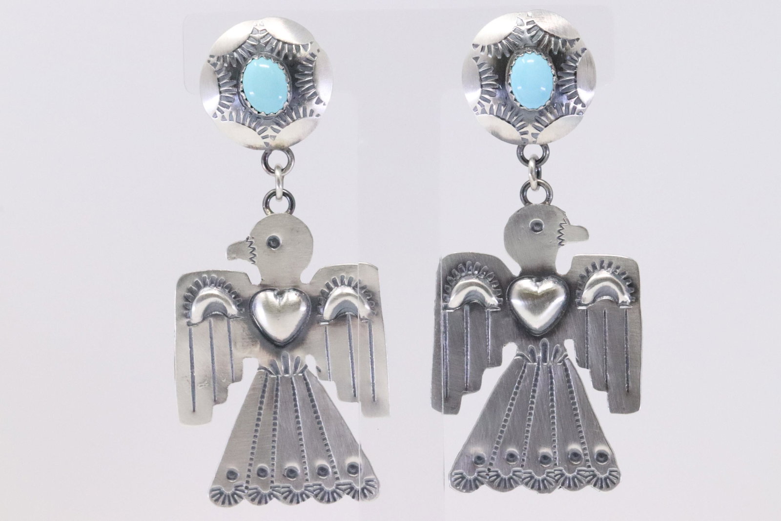Native American Navajo Handmade Sterling Silver: This is a Native American Navajo Handmade Sterling Silver Turquoise Thunderbird Post Dangle Earrings by Tim Yazzie. Earrings Length is 3.00in