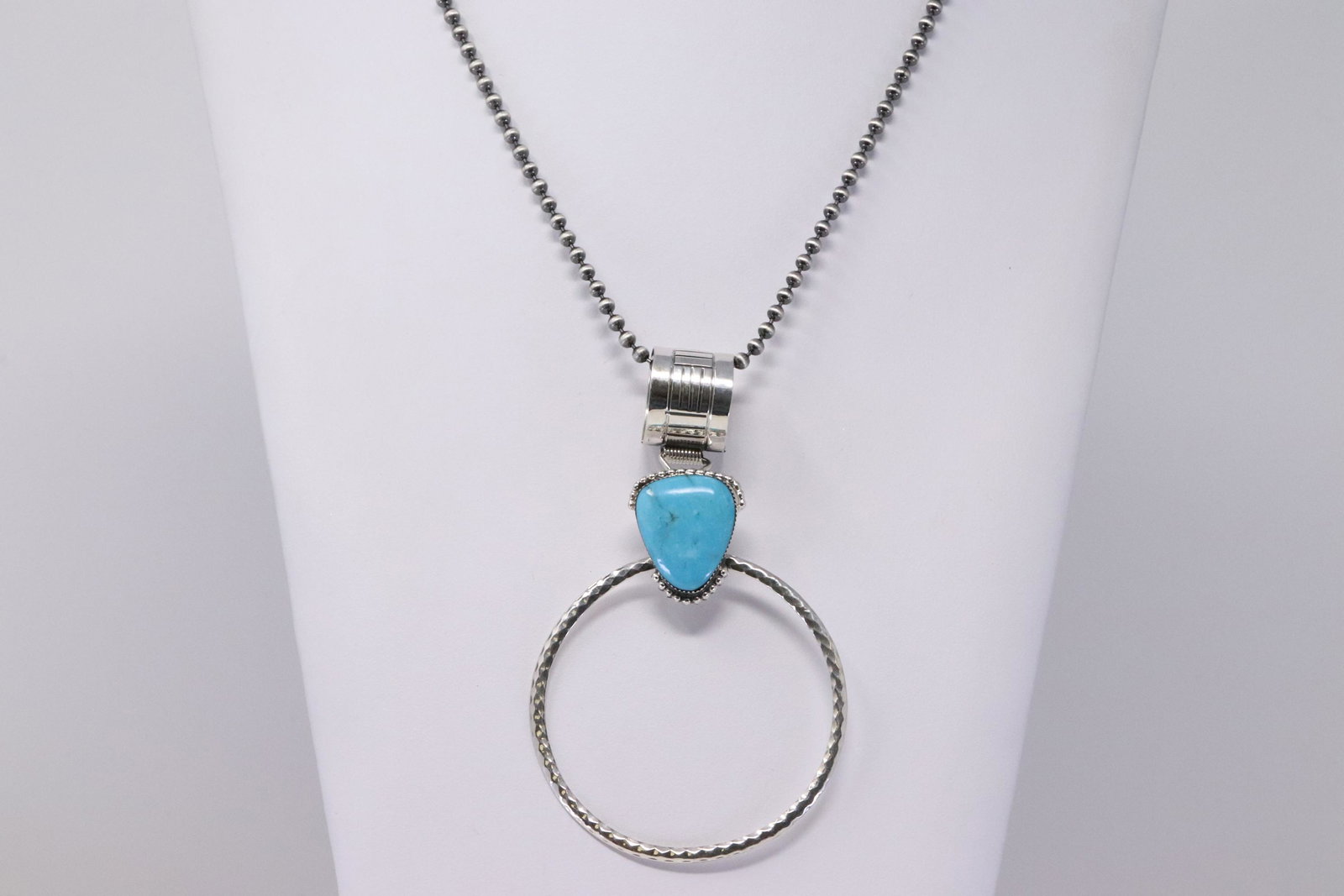 Native American Navajo Handmade Sterling Silver Kingman: This is a Native American Navajo Handmade Sterling Silver Kingman Turquoise Pendant by Greg Yazzie with 925 Necklace. Length is 24.00in
