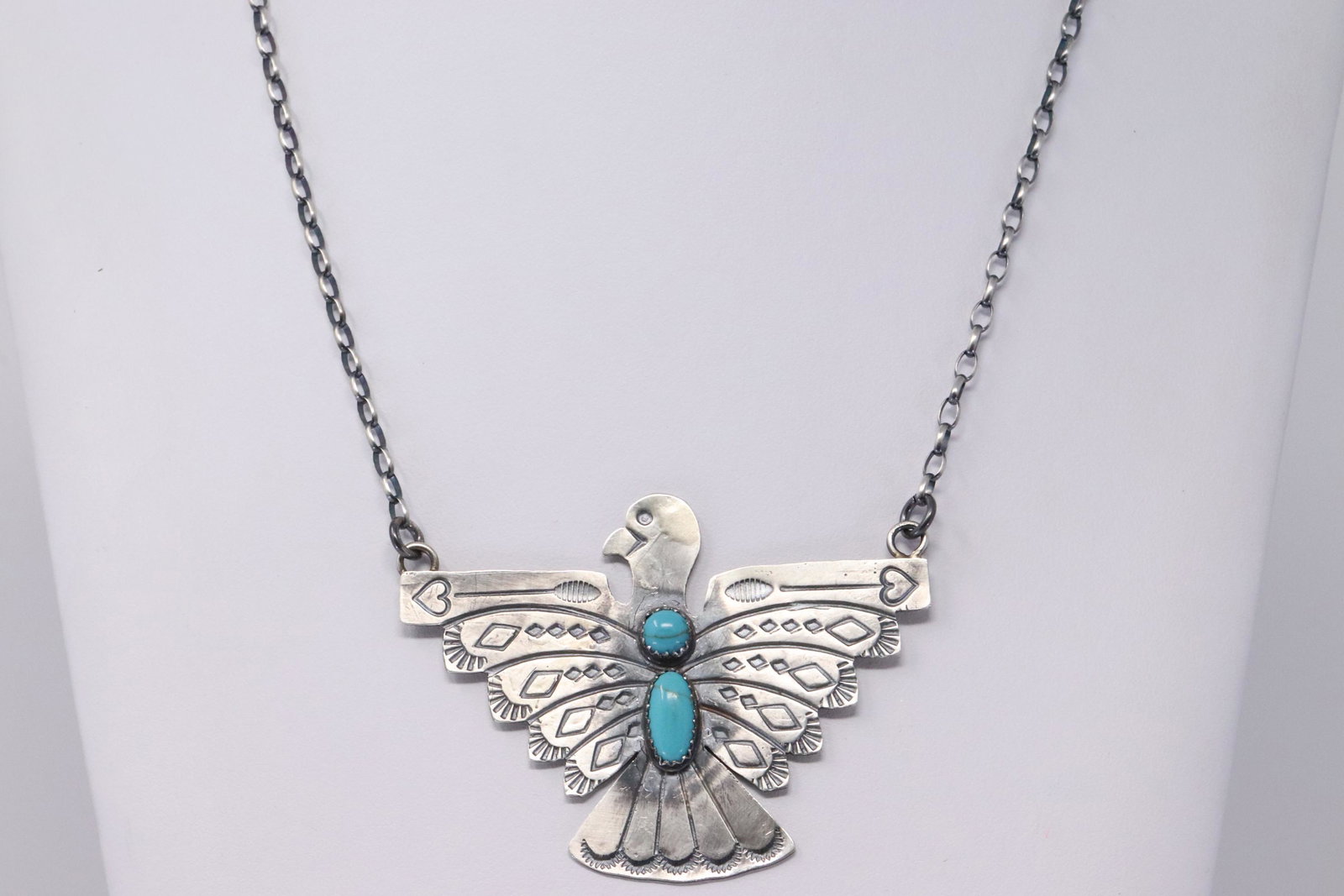 Native American Navajo Handmade Sterling Silver: This is a Native American Navajo Handmade Sterling Silver Turquoise Thunderbird Necklace by Tim Yazzie. Necklace Length is 18.00in