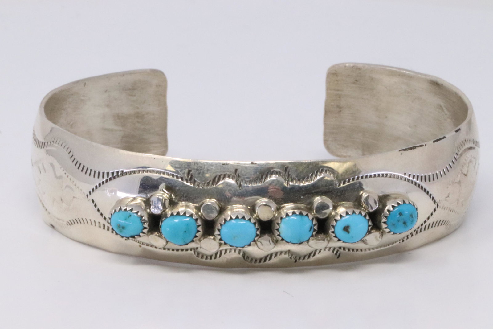 Native American Navajo Handmade Sterling Silver: This is a Native American Navajo Handmade Sterling Silver Turquoise Bracelet By Randall Dalgai.Bracelet Measurement inside is 6.00in