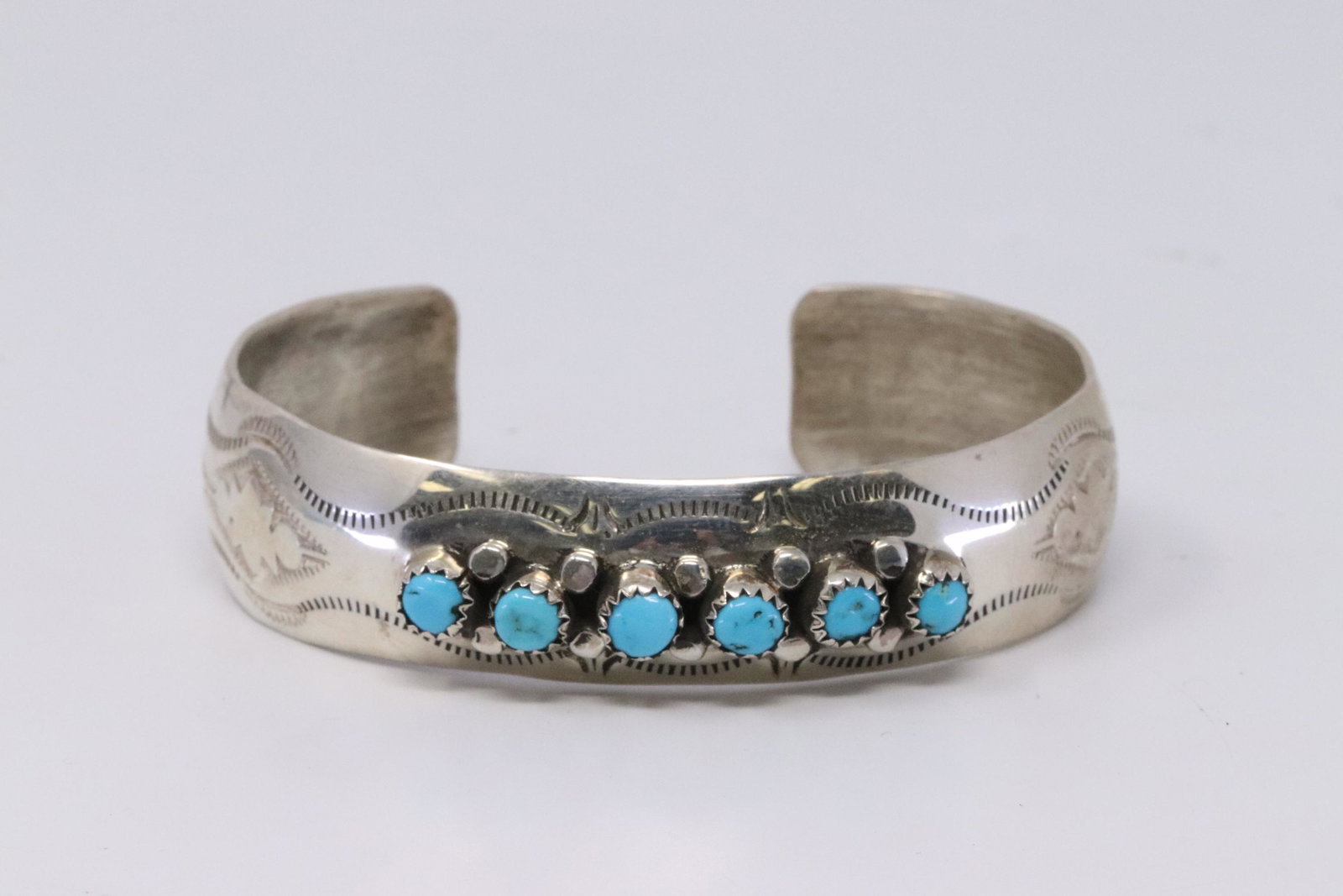 Native American Navajo Handmade Sterling Silver: This is a Native American Navajo Handmade Sterling Silver Turquoise Bracelet by Randall Delgai.