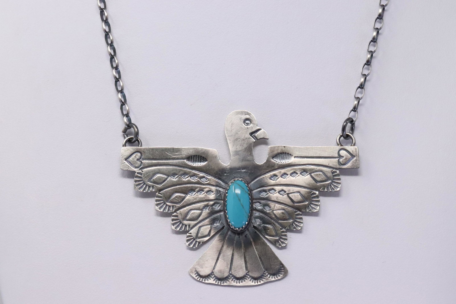 Native American Navajo Handmade Sterling Silver: This is a Native American Navajo Handmade Sterling Silver Turquoise Thunderbird Necklace by Tim Yazzie.Necklace Length is 18.00in