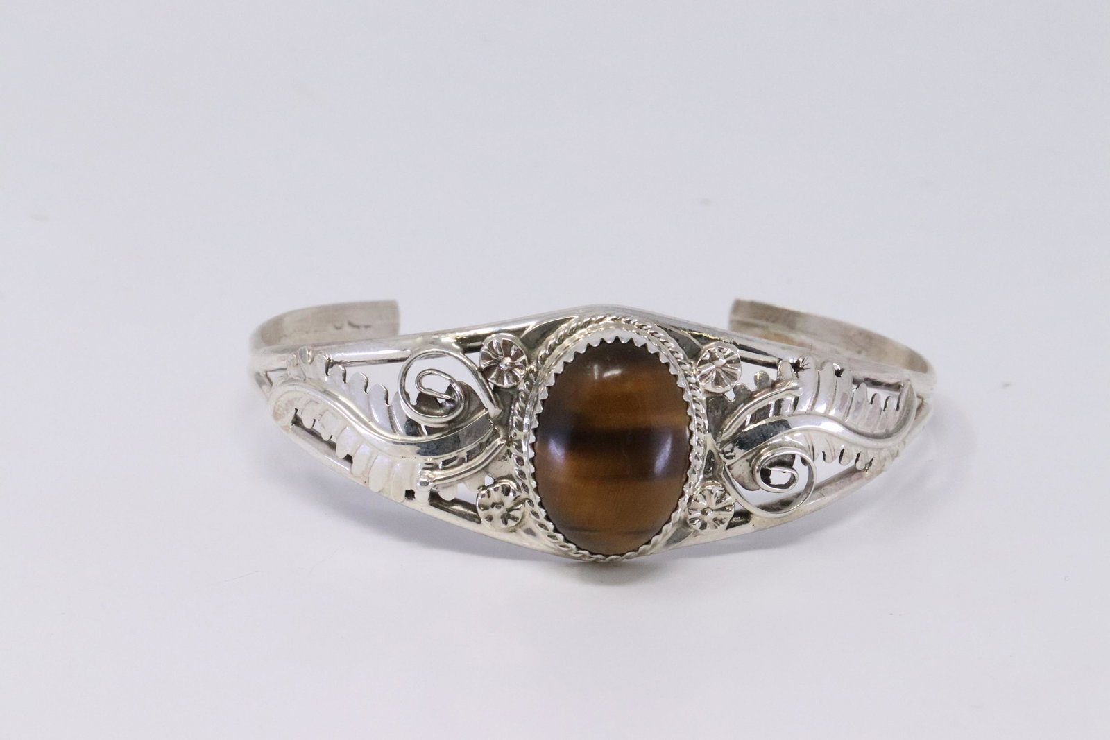 Native American Navajo Handmade Sterling Silver Tiger: This is a Native American Navajo Handmade Sterling Silver Tiger Eye Bracelet by Renee Yazzie.