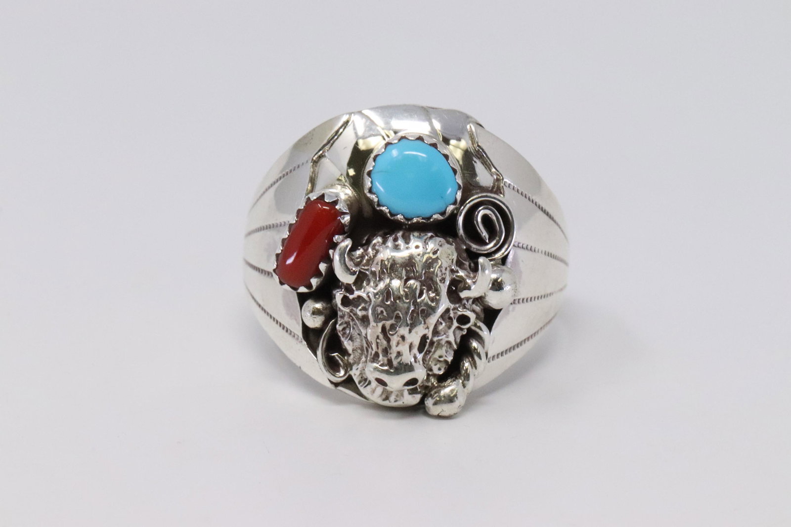Native American Navajo Handmade Sterling Silver: This is a Native American Navajo Handmade Sterling Silver Turquoise and Coral Buffalo Ring by Grace Smith. Ring size is 11.00