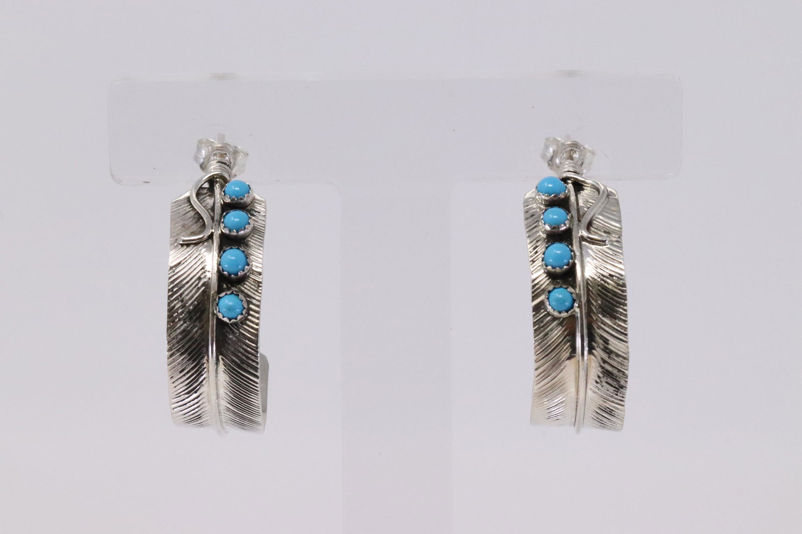 Native American Navajo Handmade Sterling Silver: This is a Native American Navajo Handmade Sterling Silver Turquoise Feather Earrings by Byron Begay. REF: R.Y