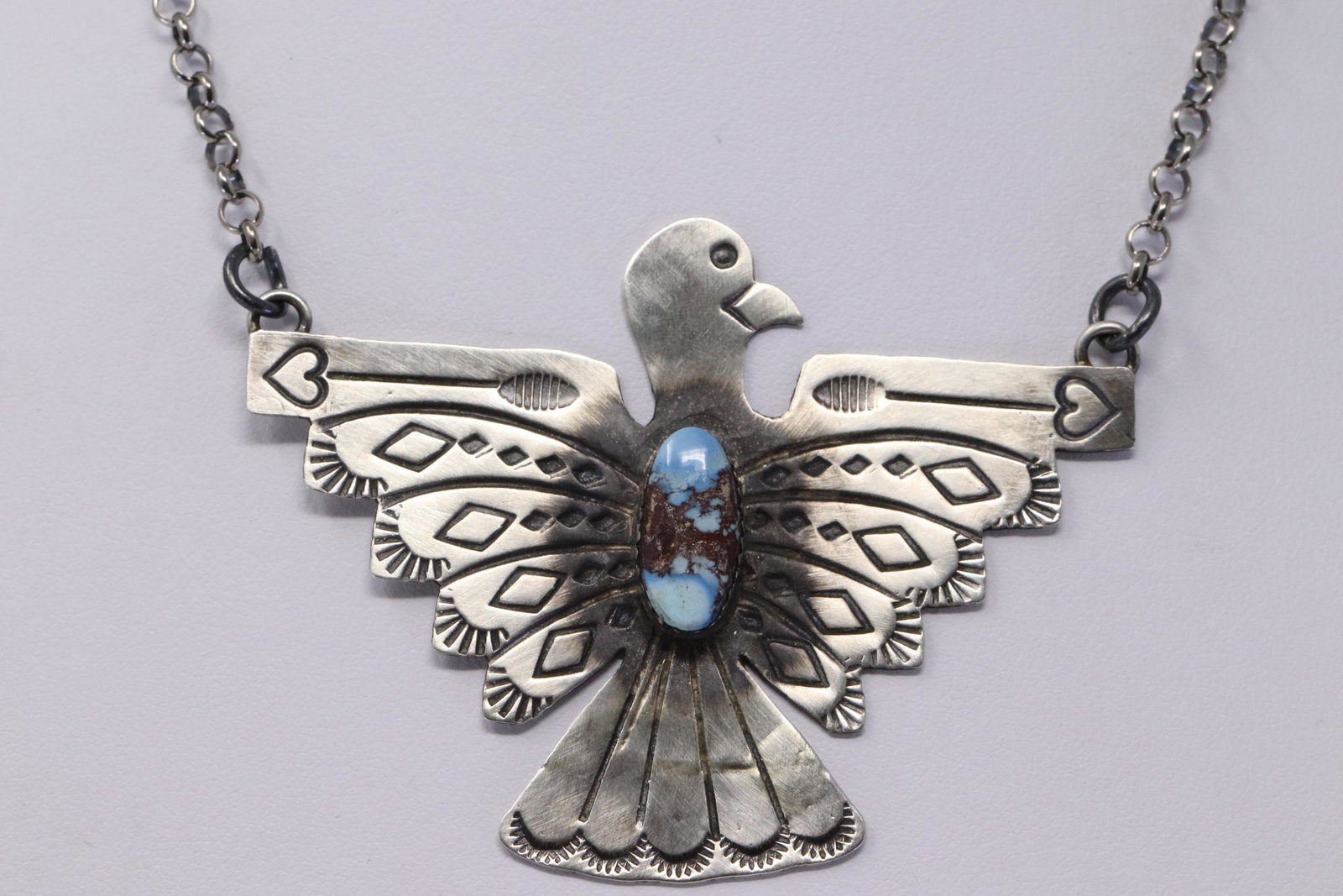 Native American Navajo Handmade Sterling Silver Golden: This is a Native American Navajo Handmade Sterling Silver Golden Hill Turquoise Thunderbird Necklace by Tim Yazzie. Necklace Legth is 16.00"