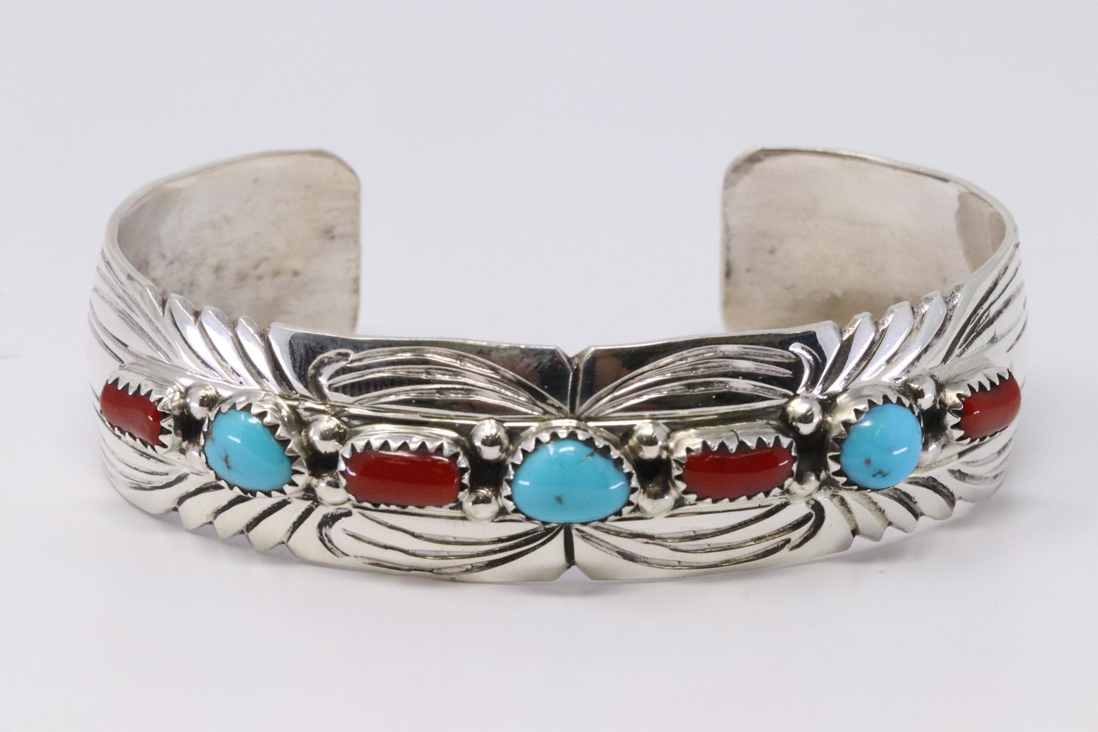 Native American Navajo Handmade Sterling Silver: This is a Native American Navajo Handmade Sterling Silver Turquoise and Coral Bracelet by Julia Slinky. REF: A.B