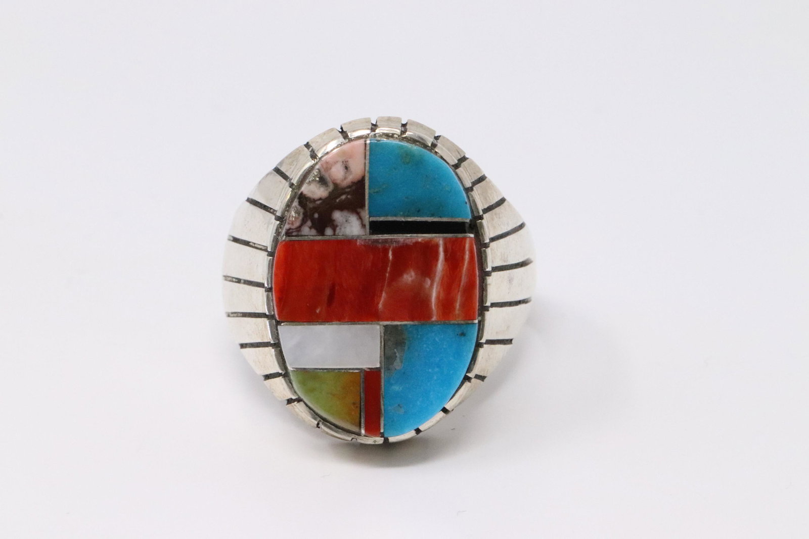 Native American Navajo Handmade Sterling Silver: This is a Native American Navajo Handmade Sterling Silver Multi-Color Inlay Ring by Ray Jack. Ring size is 11.75