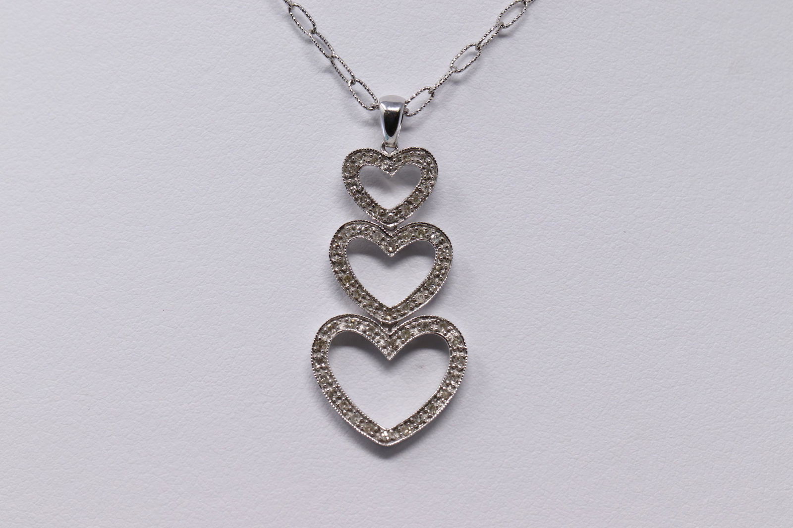 14Kt White Gold Triple Heart Diamond Pendant (1 of 4)