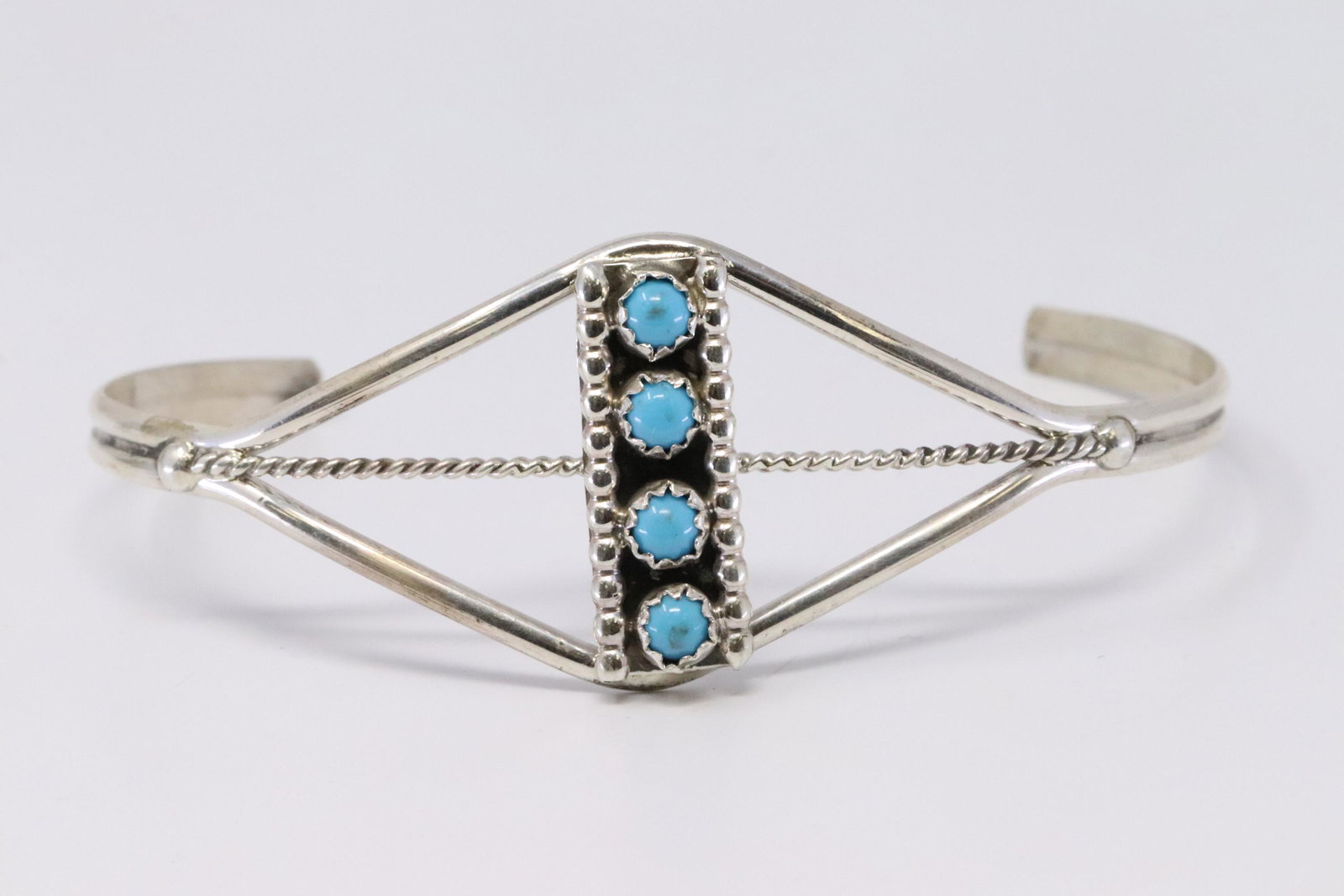 Native American Navajo Handmade Sterling Silver: This is a Native American Navajo Handmade Sterling Silver Turquoise Bracelet by Janice Spencer.