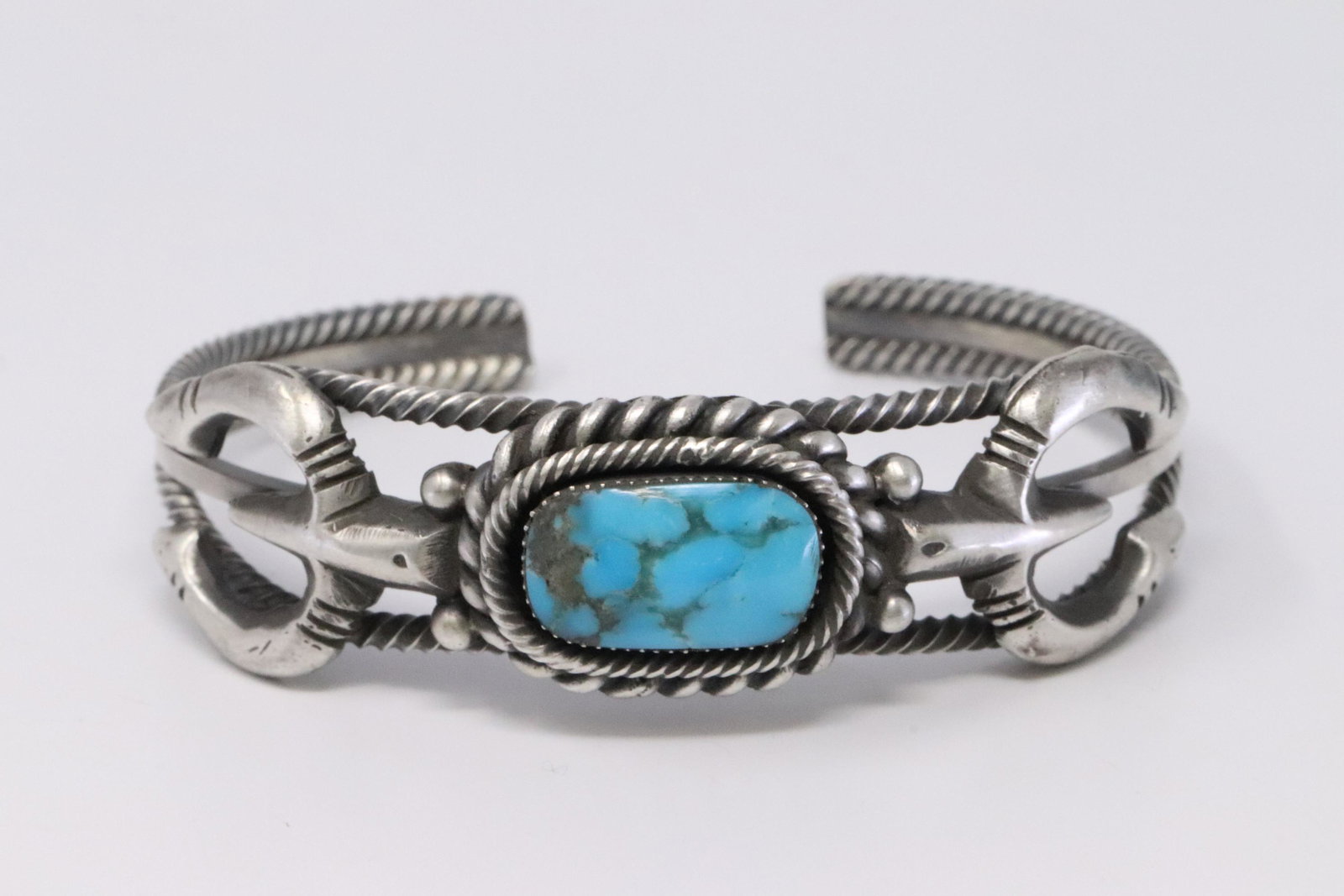 Native American Navajo Handmade Sterling Silver: This is a Native American Navajo Handmade Sterling Silver Turquoise Bracelet by Daniel Benally. REF: R.B