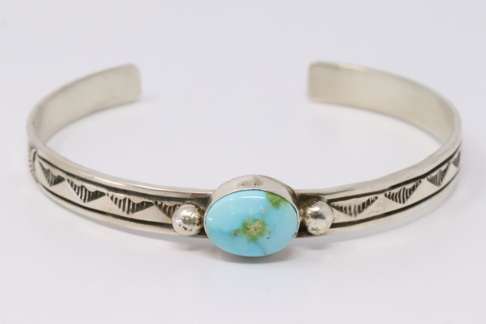 Native American Handmade Sterling Silver Navajo: This is a Native American Handmade Sterling Silver Navajo Turquoise Bracelet By Rick Enriquez.