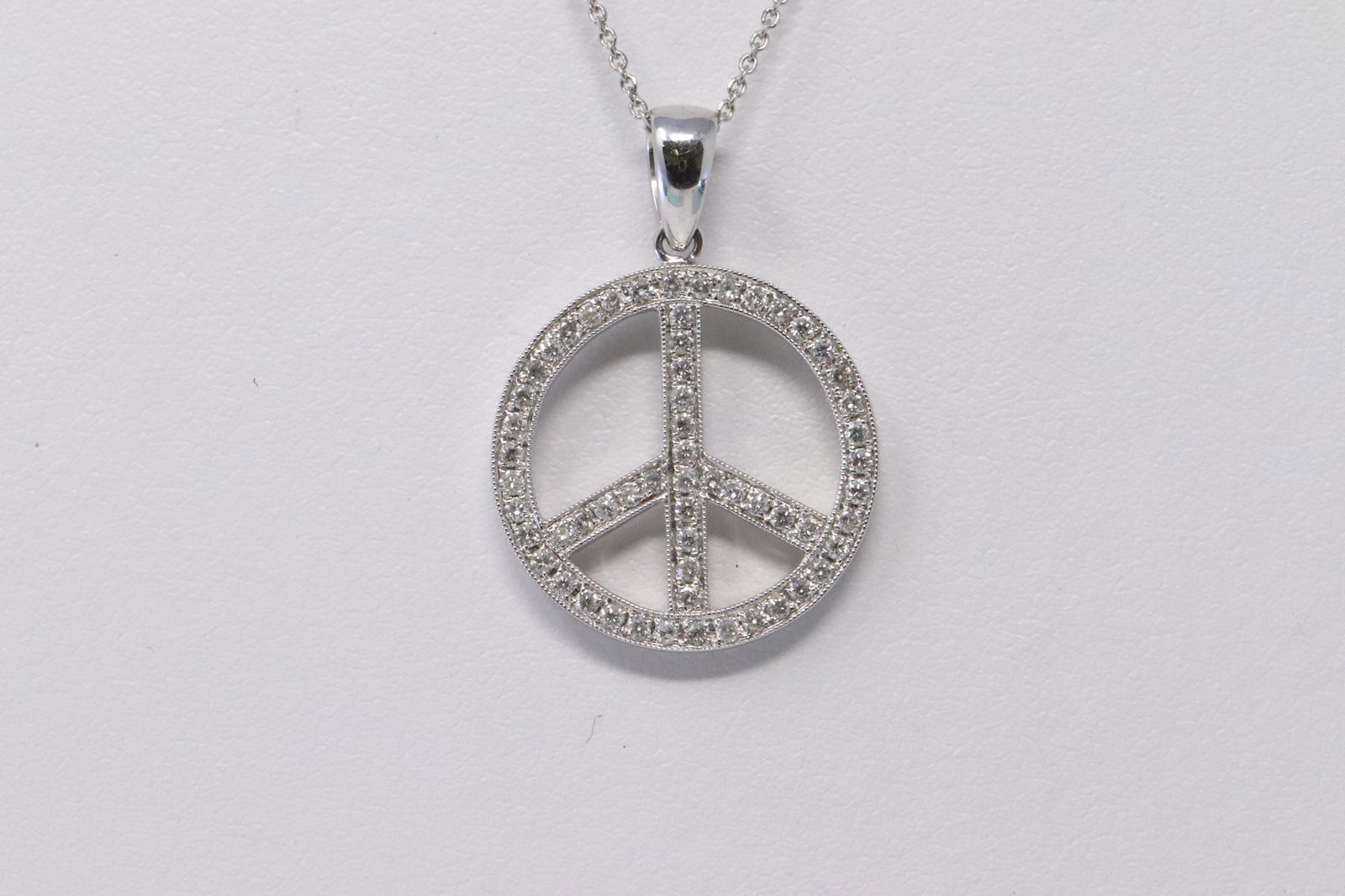 18Kt Diamond Peace Pendant (1 of 2)