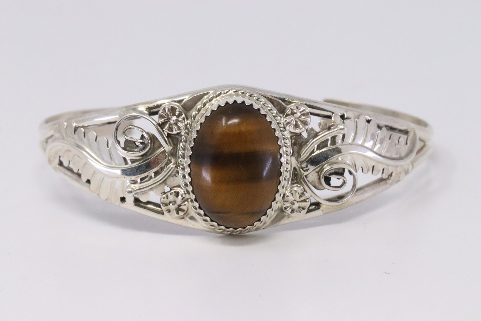 Native American Handmade Sterling Silver Navajo Tiger: This is a Native American Handmade Sterling Silver Navajo Tiger Eye Stone Bracelet By Renee Yazzie.