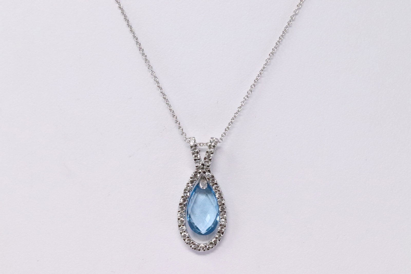 14Kt Diamond Blue Topaz Pendant. (1 of 5)