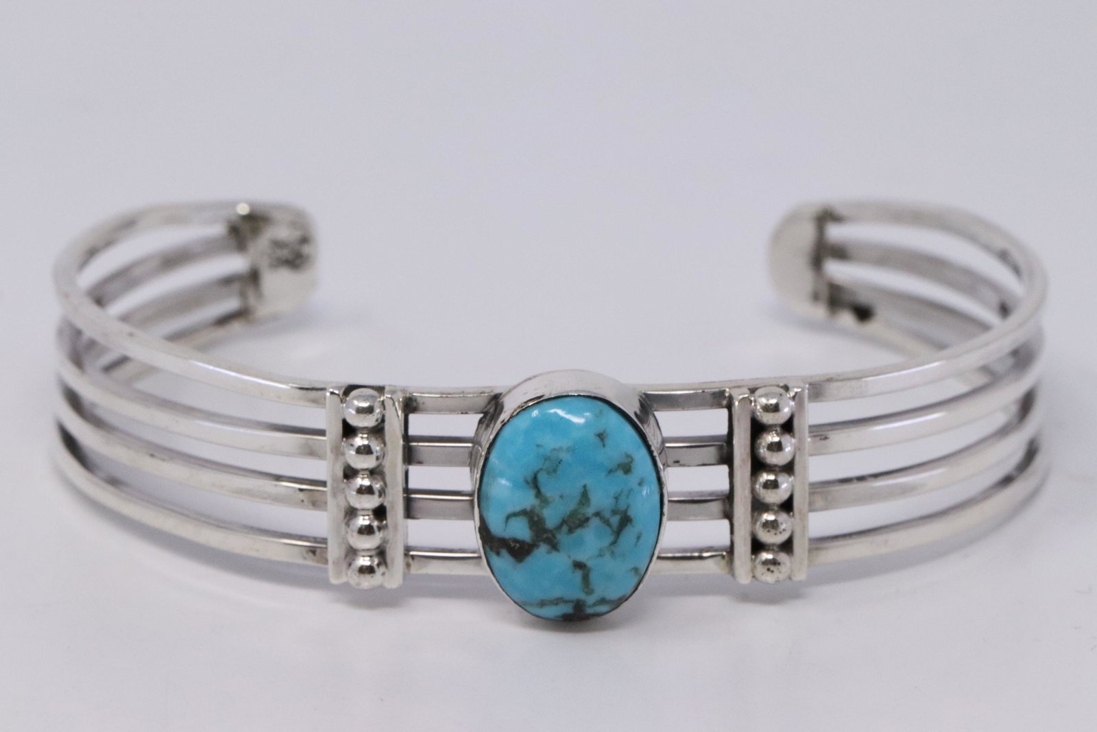 Native American Navajo Handmade Sterling Silver: This is a Native American Navajo Handmade Sterling Silver Turquoise Bracelet By Grace Kenneth.