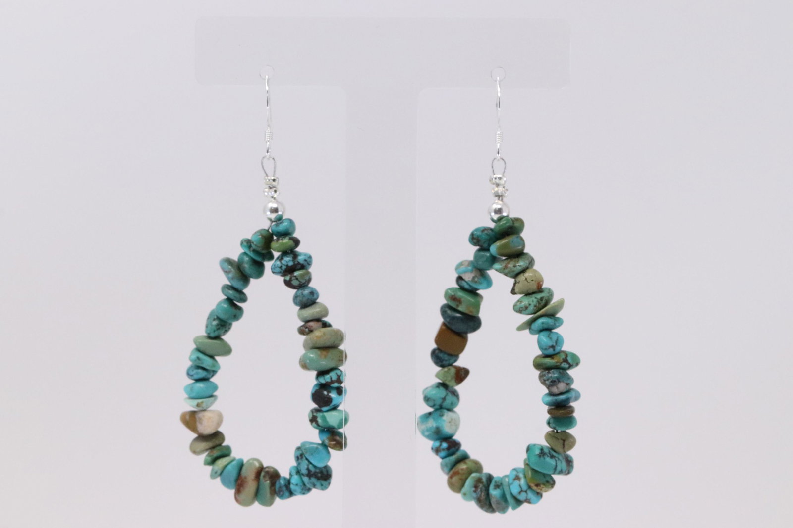 Native American Navajo Handmade Sterling Silver Hoop: This is a Native American Navajo Handmade Sterling Silver Hoop Turquoise Dangling Earring's.
