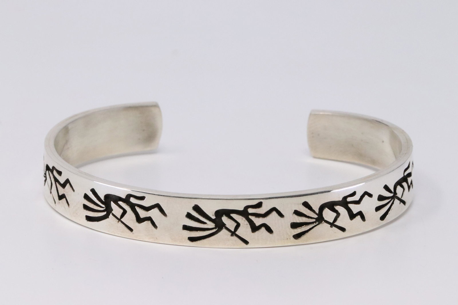 Native American Navajo Handmade Sterling Silver: This is a Native American Navajo Handmade Sterling Silver Bracelet by Calvin Peterson. REF: I.D
