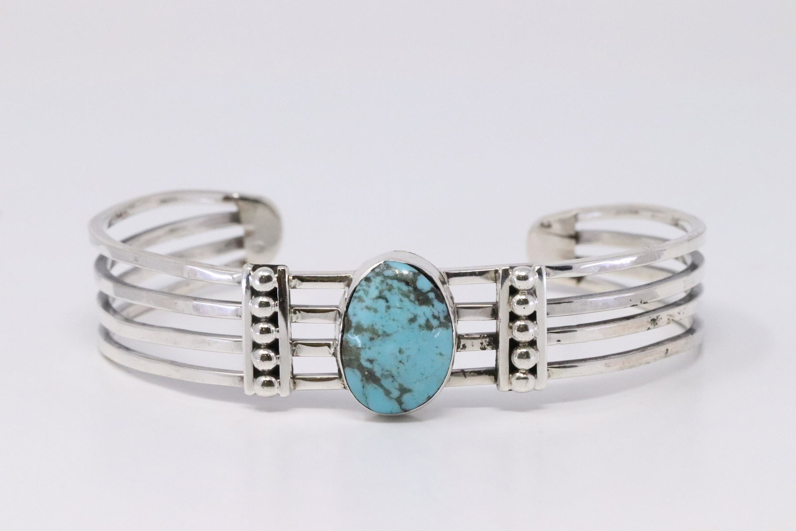 Native American Navajo Handmade Sterling Silver: This is a Native American Navajo Handmade Sterling Silver Turquoise Bracelet By Grace Kenneth.
