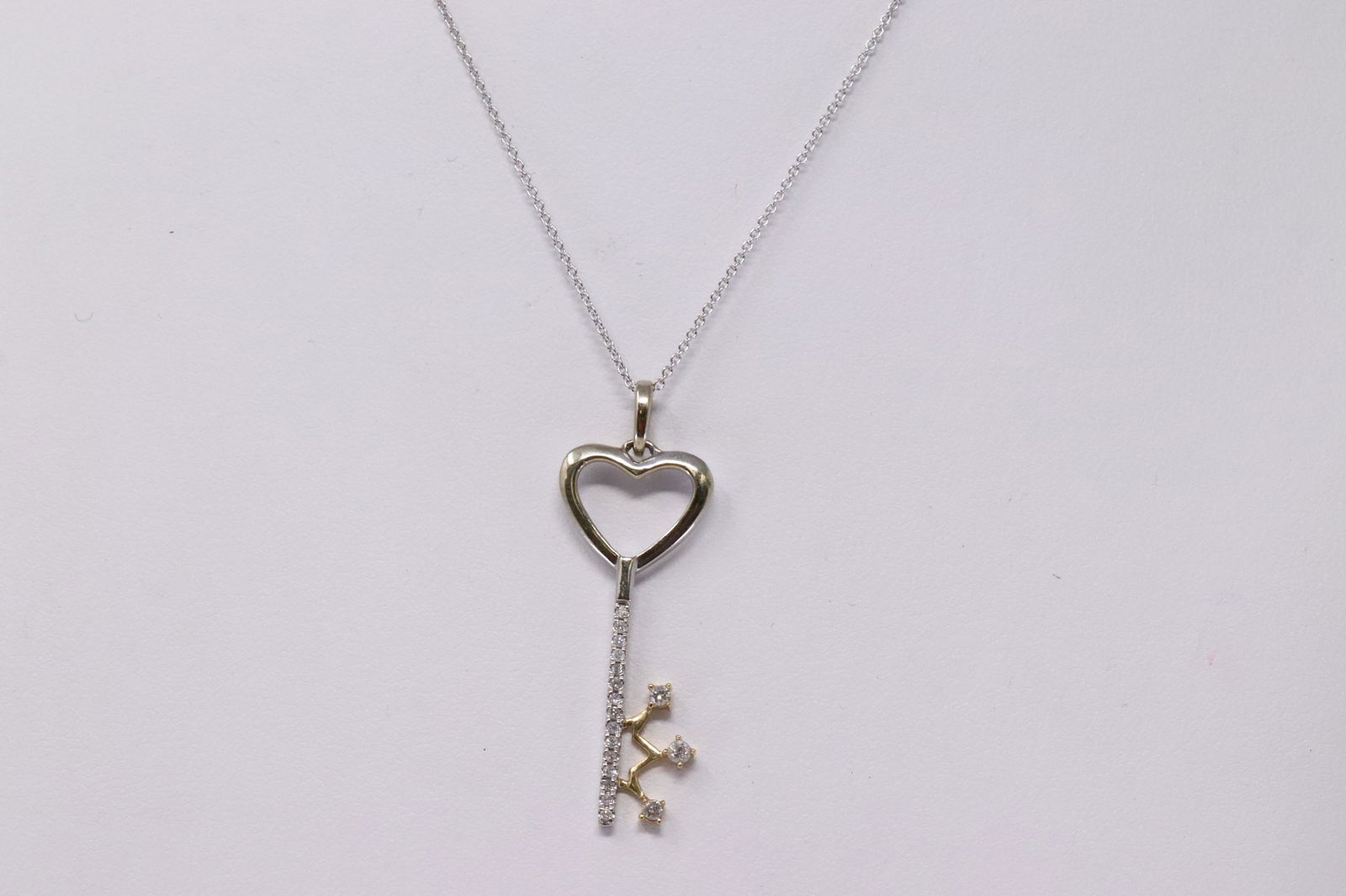 18Kt Promise Key Diamond Pendant . (1 of 4)