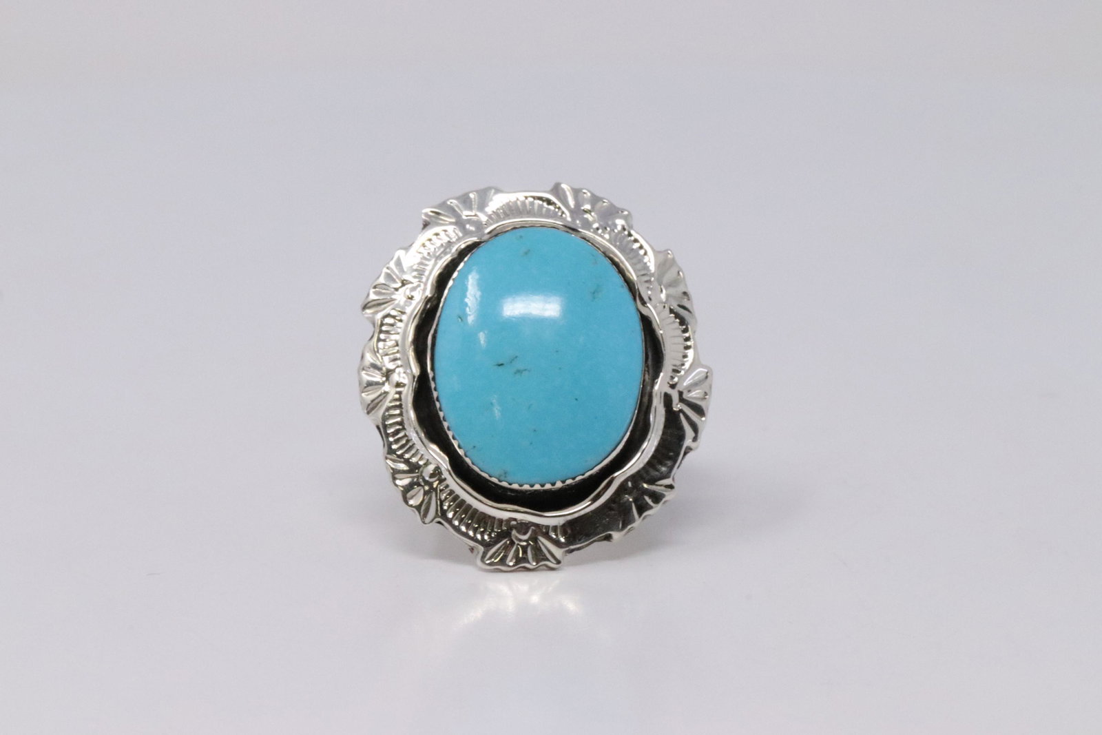 Native American Navajo Handmade Sterling Silver: This is a Native American Navajo Handmade Sterling Silver turquoise Ring By Daniel Benally. Ring size: 6.00.