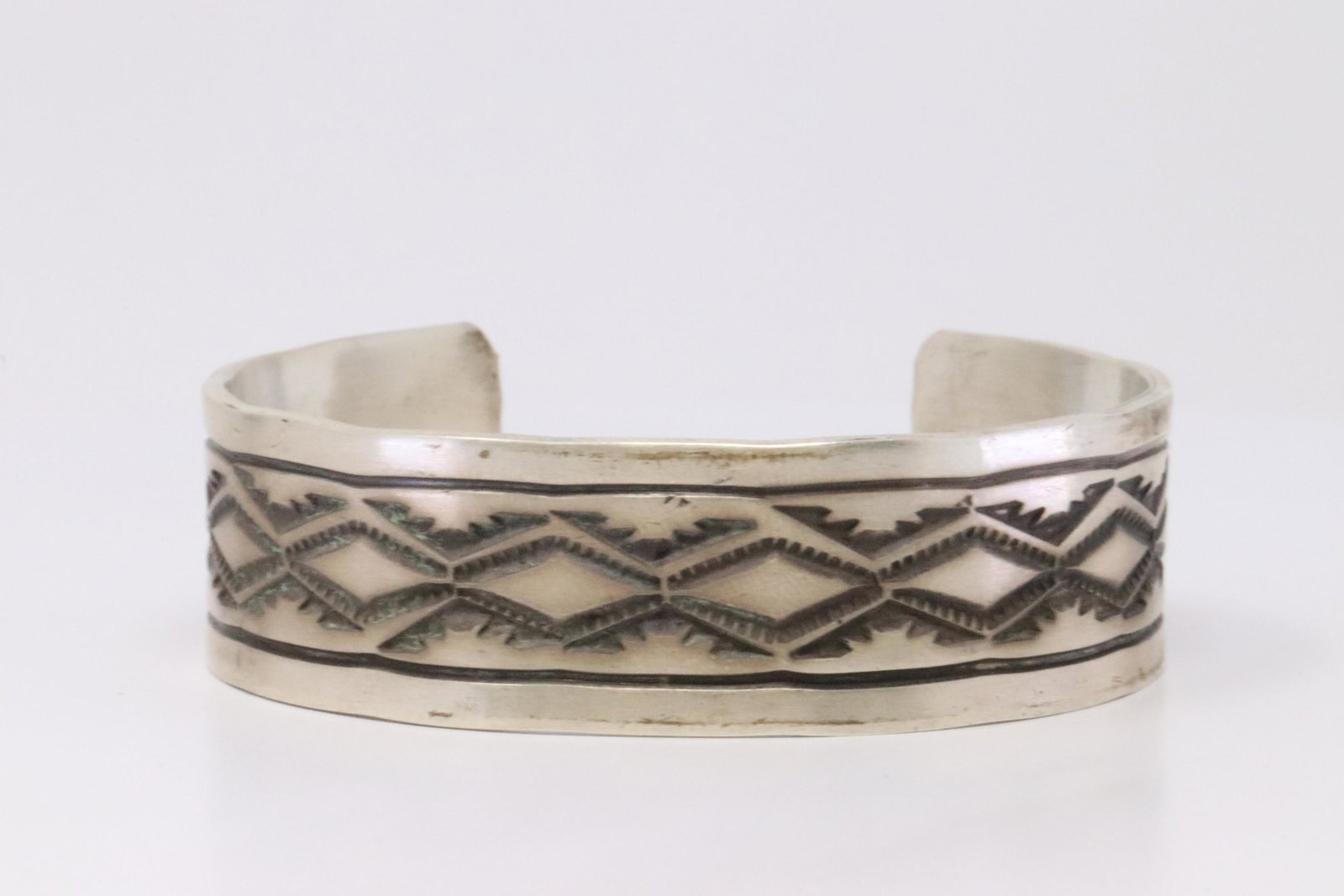 Native America Navajo Handmade Sterling Silver Bracelet: This is a Native America Navajo Handmade Sterling Silver Bracelet By Rick Enriquez.