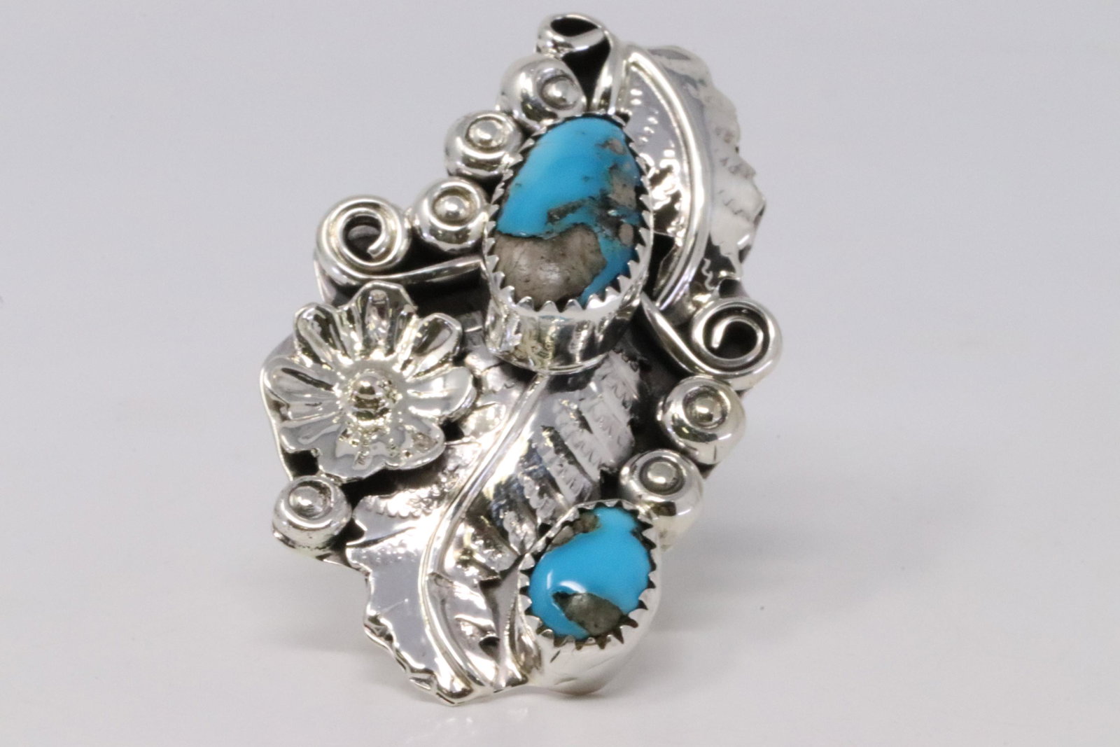 Native America Handmade Navajo Sterling Silver: This is a Native America Handmade Navajo Sterling Silver Turquoise Ring By Harry B.Yazzie. Ring size: 6.00.