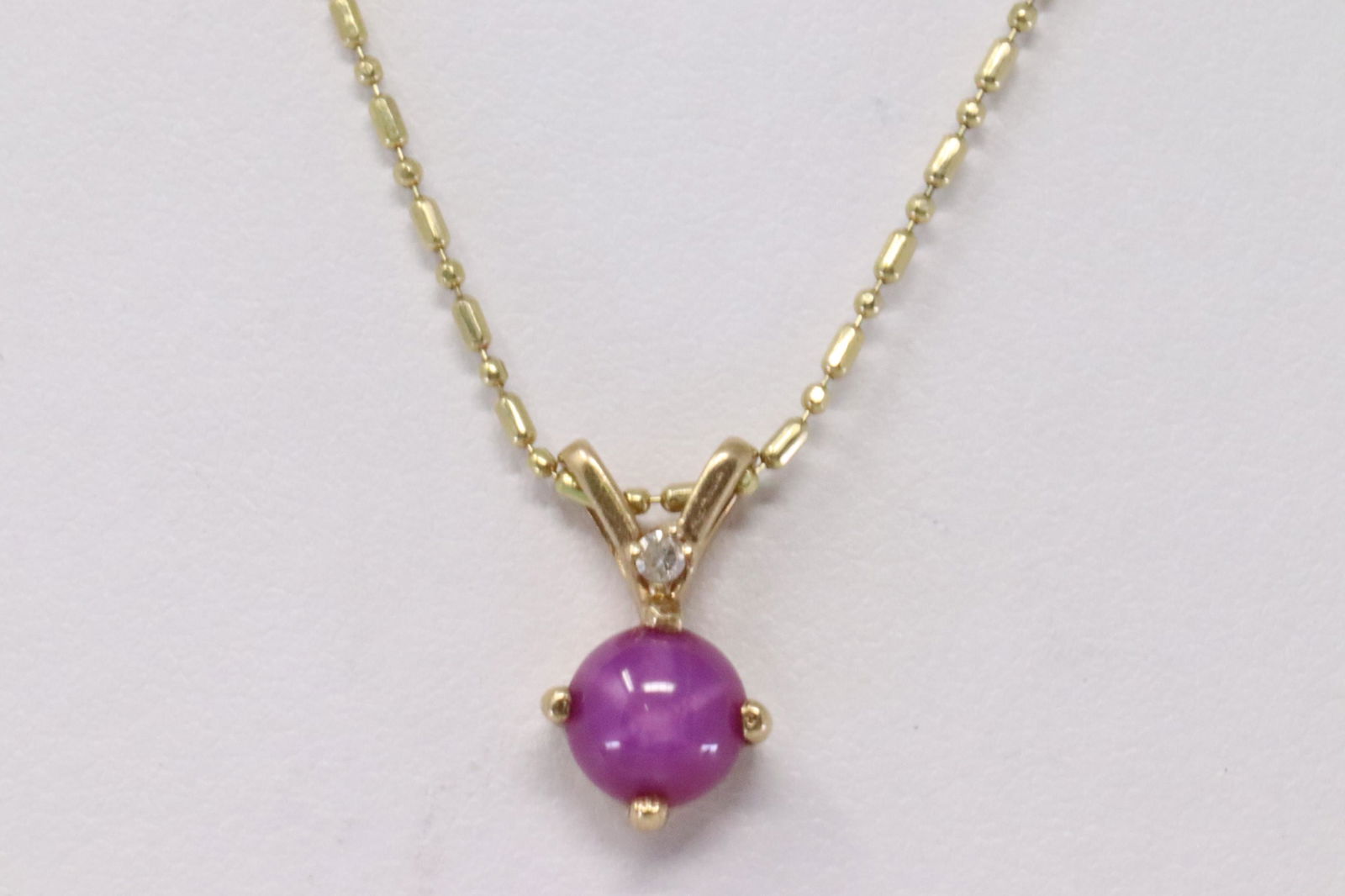 14Kt Yellow Gold Star Ruby Diamond Pendant. (1 of 4)