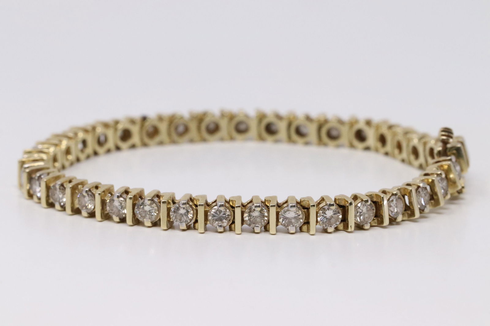 14KT Yellow Gold Diamond Tennis Bracelet. (1 of 5)
