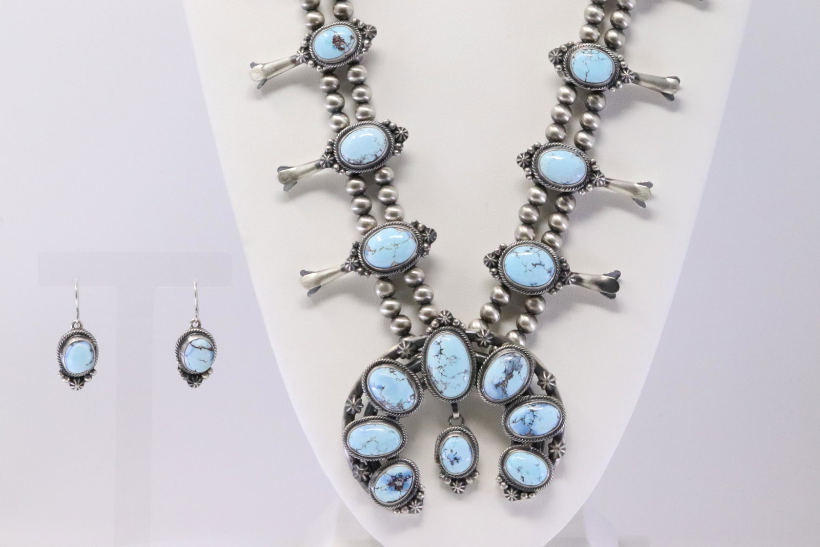 Native American Navajo Handmade Sterling Silver Golden: This is a Native American Navajo Handmade Sterling Silver Golden Hill Turquoise Squash Blossom Necklace & Earring's Set By Thomas Francisco. Necklace length: 26.00"