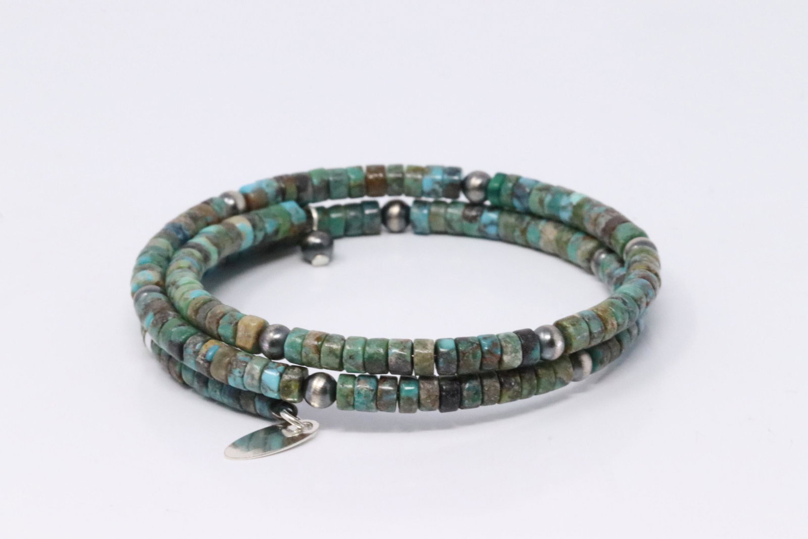 Native American Navajo Handmade Sterling Silver: This is a Native American Navajo Handmade Sterling Silver Turquoise Stretch Bracelet.